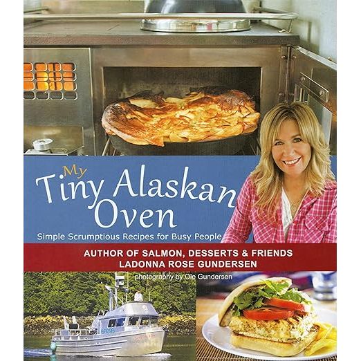 Embark on a gastronomic journey through the rugged landscape of Alaska with My Tiny Alaskan Oven, the tantalizing cookbook penned by the renowned culinary artisan Ladonna Gundersen. With each turn of the page, home chefs are whisked away to the breathtaking wilderness where Gundersen crafts sumptuous dishes in her quaint kitchen. Her recipes, born from the constraints of a modest oven and the creative use of regional produce, prove that simplicity and limitation can indeed be the catalysts for culinary brilliance. Suitable for novices and experienced cooks alike, this collection of easy-to-master recipes empowers anyone to bring a taste of Alaska into their home.

Savor the authenticity of Alaskan cuisine as Gundersenn guides you through a handpicked selection of heartwarming recipes. Indulge in the rustic charm of an Alaskan blueberry pie, the comforting embrace of smoked salmon chowder, or the sweet burst of flavor in a wild berry cobbler. Gundersen's personal narrative intertwines with her culinary creations, offering readers more than just a recipe book — My Tiny Alaskan Oven is an intimate portrait of love and life in the Alaskan wilderness, shared through the universal language of food.

Immerse yourself in the culinary heritage of the Last Frontier with My Tiny Alaskan Near Cook, a treasure trove for any culinary enthusiast. Each page radiates Ladonna Gundersen's profound passion for both her craft and the Alaskan outdoors. This cookbook isn’t just a guide to creating delicious meals; it’s an invitation to embrace the art of cooking with simplicity, to champion fresh, locally-sourced ingredients, and to foster creativity in your own kitchen. Whether you're seeking to diversify your culinary repertoire or simply wish to explore the enchanting flavors of Alaska, My Tiny Alaskan Oven is a delightful companion that promises to inspire and enchant.