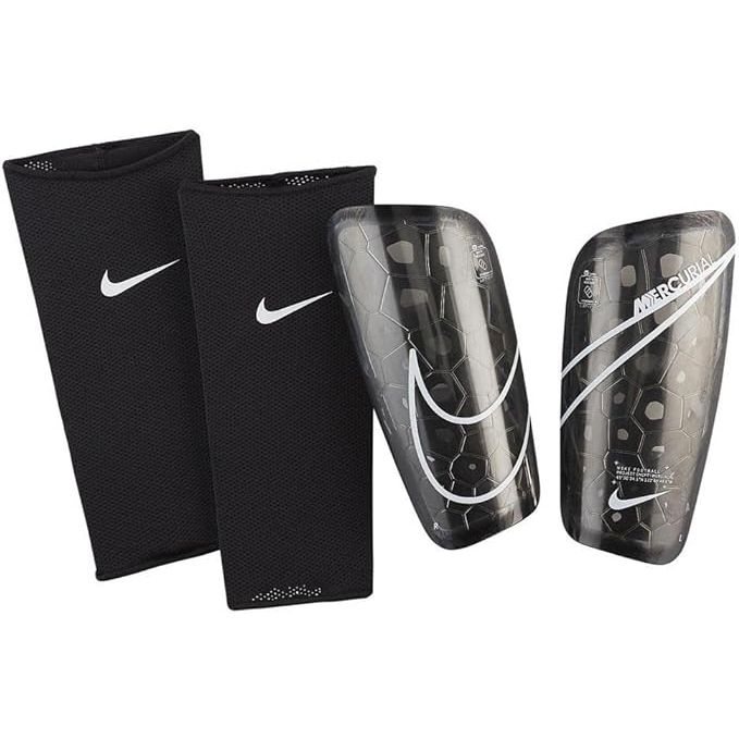 The Nike Mercurial Lite Shin Guards are lightweight and high-performance shin guards designed for soccer players. They feature a low-profile construction that fits snugly against the leg, providing minimal distractions during play. The guards are made with a durable shell that offers impact protection and a contoured design that ensures a comfortable and secure fit.

The Nike Mercurial Lite Shin Guards also include a breathable sleeve that helps keep the guards in place throughout the game. The sleeve is made with a stretchy material that allows for a custom fit and easy removal. Additionally, the guards are available in a variety of sizes to accommodate different age groups and playing levels.

Overall, the Nike Mercurial Lite Shin Guards are a popular choice among soccer players for their combination of lightweight design, durable construction, and comfortable fit. They are trusted by professionals and amateurs alike for providing reliable protection during intense matches. Description by ChatGPT.