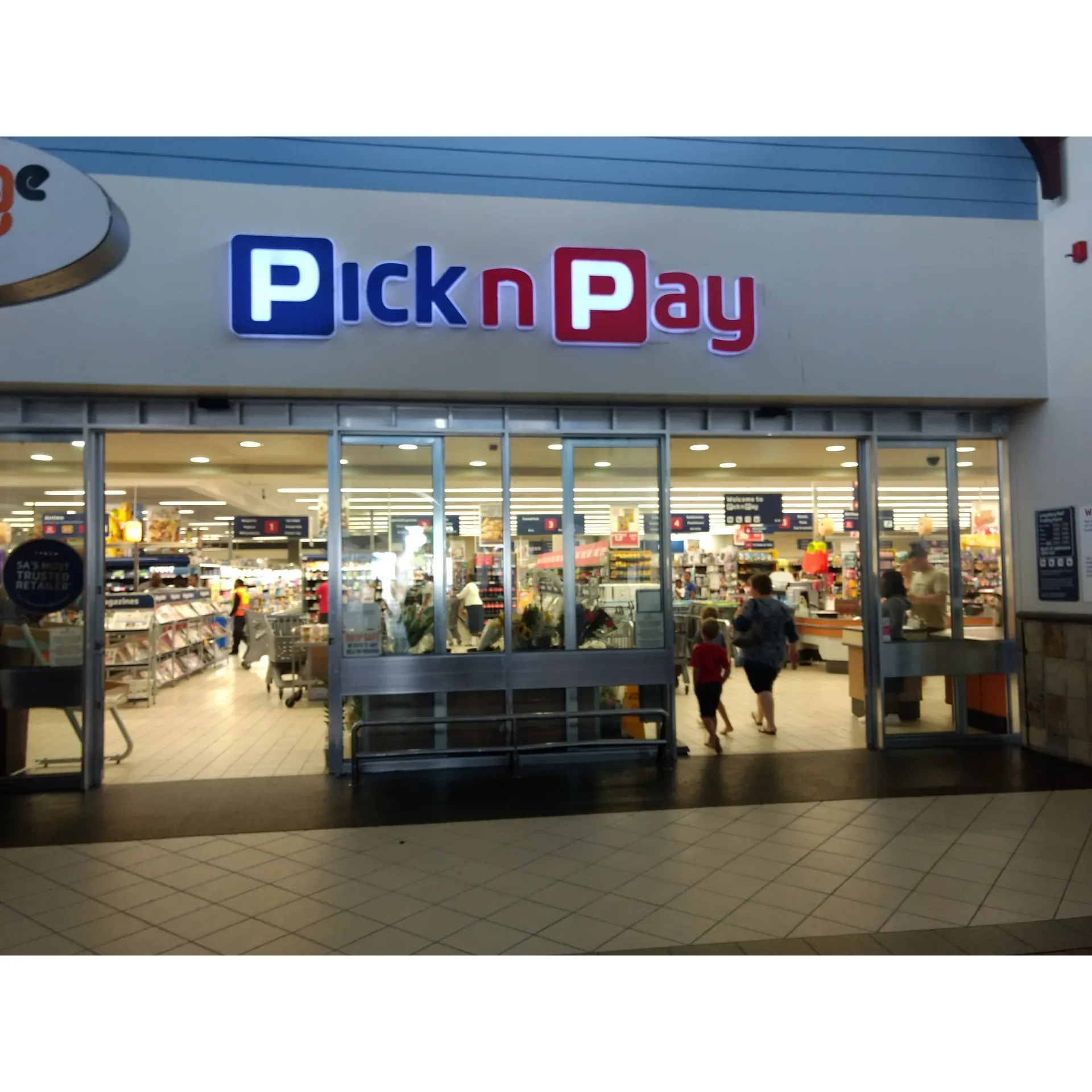 Pick n Pay Langeberg Mall has established itself as a reputable and dependable destination for a wide range of grocery needs. With a history of delivering exemplary customer service, this store takes pride in its ability to exceed shopper expectations, demonstrating an exceptional level of care and assistance, especially in times of need. This commitment to customer well-being is a testament to the compassionate and responsive nature of both the staff and management.

The shopping experience at Pick n Pay Langeberg Mall is consistently positive, highlighted by the store's cleanliness and the thorough stocking of products. Sourcing fresh and high-quality items, including succulent full chickens that delight the palate, the store ensures that every visit is both convenient and rewarding. The store's commitment to freshness is evident in the delicious, freshly baked bread that customers can enjoy, adding an extra touch of home-style warmth to their shopping.

The personal touch is further illustrated by the friendly and professional delivery drivers, who bring the Pick n Pay shopping experience right to the customer’s door with efficiency and a smile. For those who prefer to peruse the aisles, the store's environment is welcoming and well-organized, saving shoppers time and effort during their visit.

An added benefit for customers is the enjoyable selection of ready-made food, perfect for those seeking a quick and tasty meal solution. Along with the lookout for enticing in-store specials, the store occasionally offers pop-up discount codes, creating additional value for their delivery services.

Spacious and accommodating, the store is designed to cater to customers' diverse needs, and the staff is consistently available to help, ensuring that every question is answered and every need addressed. During bustling seasonal periods, the efficiency of Pick n Pay Langeberg Mall shines through, as the shelves remain fully stocked and the atmosphere retains its characteristic cheer and organization.

For a hassle-free, friendly, and satisfying grocery experience, Pick n Pay Langeberg Mall stands out, consistently earning high marks from its community of shoppers. Description by ChatGPT.