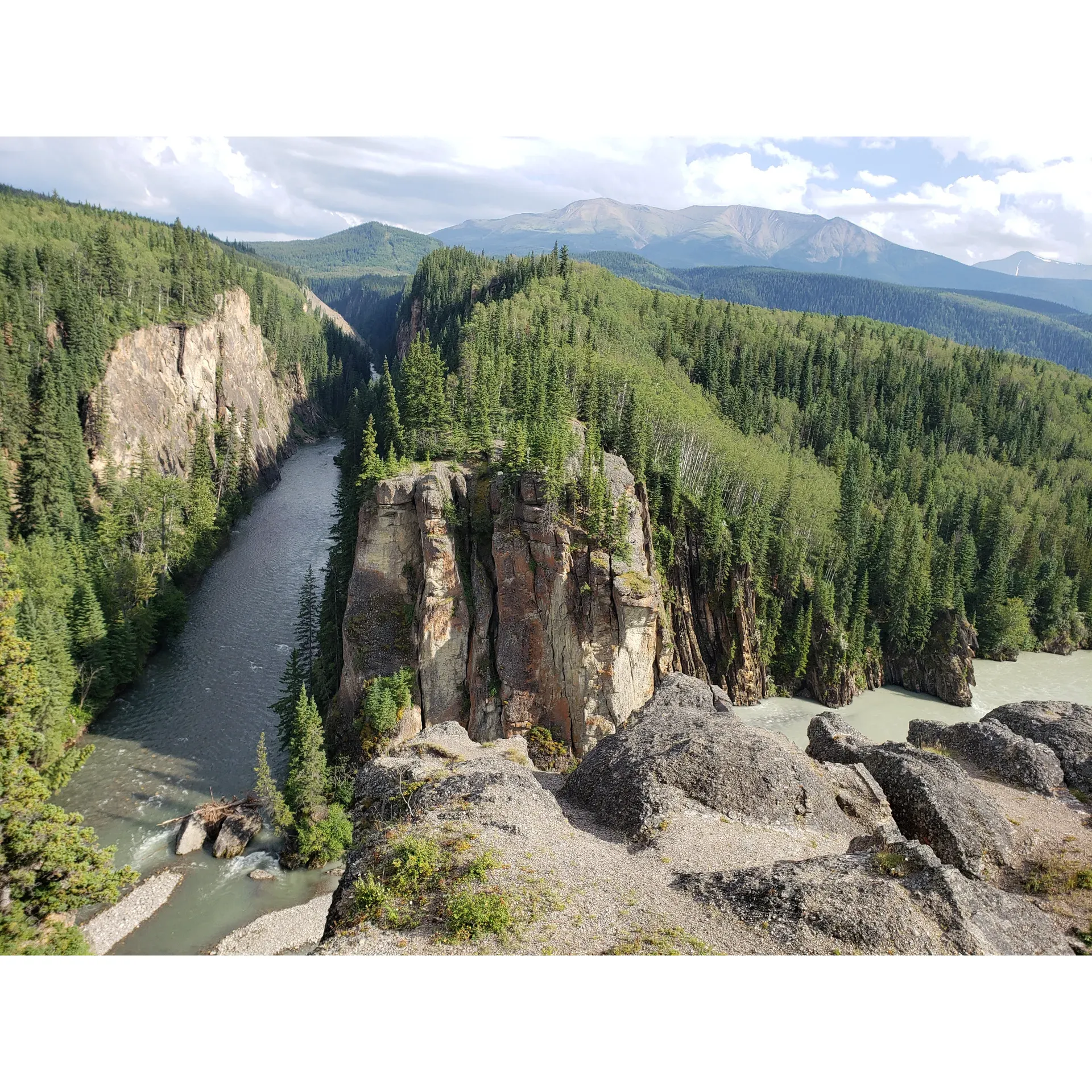 Discover spectacular geological wonders and serene natural beauty at Sulphur Gates Provincial Recreation Area, a scenic destination perfect for outdoor enthusiasts and nature lovers. Embark on a transformative journey with a short hike to the awe-inspiring Giant Split Rock, which commands attention and admiration. Adventure continues as you explore the Sulphur Gates viewing areas, where the confluence of the Smoky and Sulphur Rivers presents a dramatic scene with exquisite views from an elevated perspective. This panorama of nature's artistry is regarded as well worth the visit, with many visitors expressing that the vantage points provide stunning, picture-perfect sights.

For those wishing to linger and soak in the tranquil atmosphere, the area affords ample opportunity to relax in the presence of Alberta's picturesque wilderness. The recreation area welcomes canine companions, ensuring that your furry friends can join in on the hiking fun. Safety is thoughtfully considered with strategically placed guard rails along steeper trail sections, allowing for a secure and enjoyable experience for all visitors.

Adding to the appeal, the area is equipped with conveniently located amenities including picnic tables, fire pits, and washrooms near the parking area — an ideal setup for a day of adventure followed by a relaxing meal against the backdrop of nature. The gravel access road to the park is maintained, ensuring a smooth arrival to your scenic retreat.

Breathtaking vistas continue throughout the trails, offering multiple viewpoints to marvel at the rugged beauty of the Alberta landscape. Visitors are advised to respect safety measures, keeping behind barricades where necessary to enjoy the majestic scenery and rich geological textures with security and peace of mind. With its easy access, stunning views, and thoughtful facilities, Sulphur Gates Provincial Recreation Area is a true gem for those seeking to connect with nature and experience the grandeur of the Canadian Rockies up close. Description by ChatGPT.