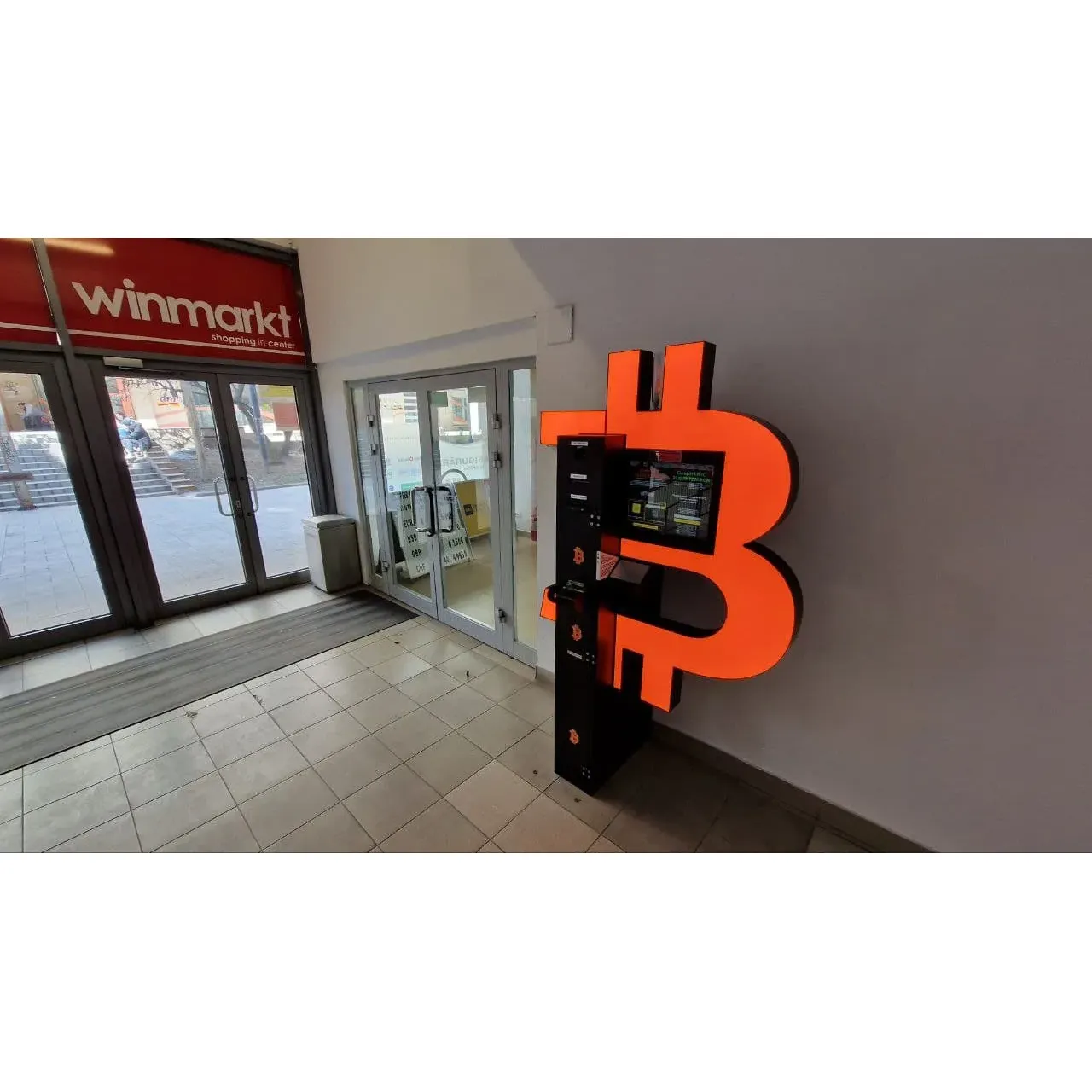 Bitcoin ATM - Shitcoins.club - Crypto Trade is a cryptocurrency exchange located at Winmarkt Ploiești in Romania. The ATM allows users to easily buy and sell Bitcoin for cash. Customers can use the machine to purchase Bitcoin with Romanian Leu or exchange their Bitcoin for cash.

The Bitcoin ATM at Shitcoins.club - Crypto Trade offers a convenient way for individuals to trade cryptocurrency without the need for a traditional bank account. The machine is user-friendly and provides a secure platform for cryptocurrency transactions. Customers can quickly access their Bitcoin holdings and make transactions with ease at this location in Ploiești.

Overall, Bitcoin ATM - Shitcoins.club - Crypto Trade aims to provide a reliable and efficient service for those looking to buy or sell Bitcoin in Romania. With its convenient location at Winmarkt Ploiești, customers can easily access the ATM and complete their cryptocurrency transactions with ease. Description by ChatGPT.