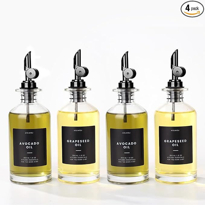 Upgrade your kitchen with this modern cooking oil dispenser bottle set. Each set includes four high-quality 11.8 oz glass bottles, four black pourers, a funnel, and a 37 label set free of oil stains.