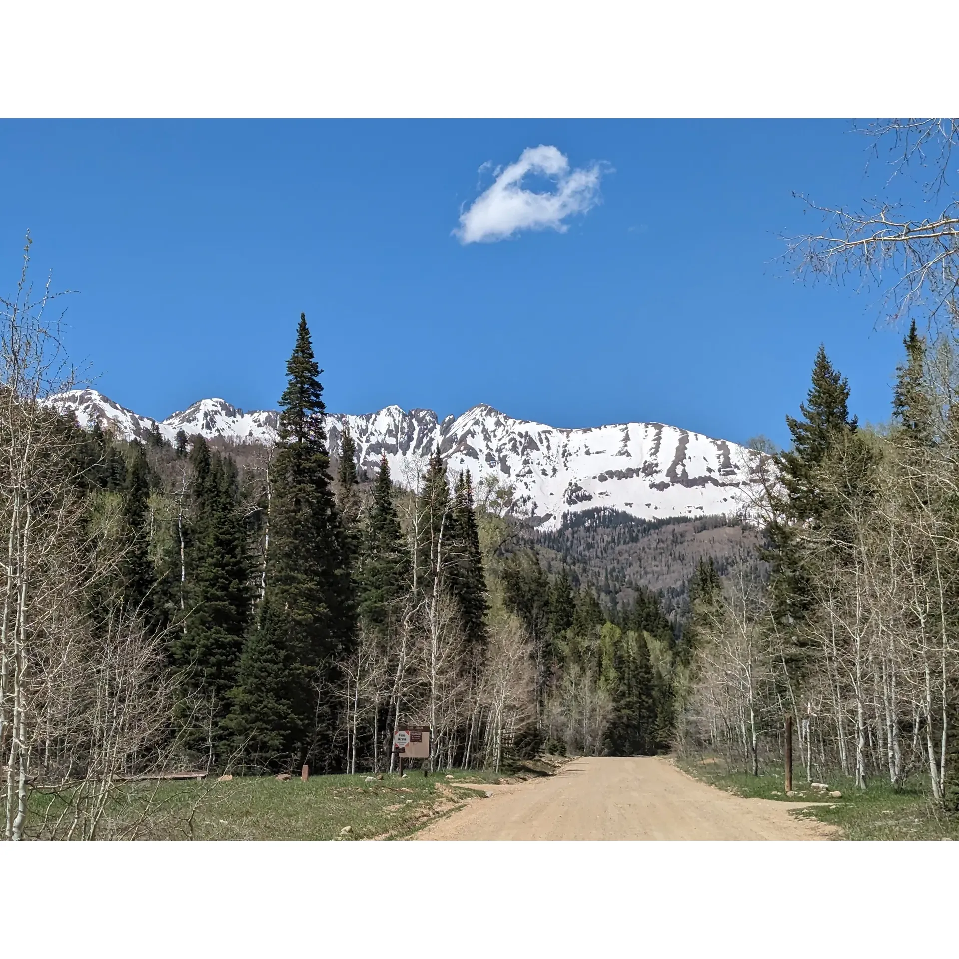 Snowslide Campground offers an invigorating escape amidst the splendor of the San Juan National Forest, right by the tranquil La Plata River. Providing an idyllic setting for a weekend getaway, this well-maintained sanctuary is a first-come, first-served haven, ideal for the spontaneous adventurer.

Priced affordably at $18 per night, as of July 2022, Snowslide Campground is the epitome of rustic charm fused with thoughtful conveniences. Each campsite comes equipped with a table, benches, and a grill for that perfect outdoor feast, allowing for memories to be made under the canopy of stars. The spaciousness of the sites, like the much-loved Campground #1, ensures privacy and a sense of seclusion, even with the proximity of fellow campers. 

For those traveling with furry companions, the campground offers the delight of freedom, where well-behaved dogs can enjoy their own off-leash adventures within the confines of your campsite. Coupled with an approachable and diligent host, the campground maintains impeccably clean outhouses, ensuring a comfortable stay despite the lack of running water. Campers are encouraged to bring their own water or make use of the nearby creek for filtering fresh mountain water.

Sites such as Campsite 11 offer direct access to the surrounding woods, complete with trails for those yearning to explore. Even though close to a road, the serenity of the campground remains largely undisturbed, preserving the tranquil atmosphere guests come to enjoy. Although traditional campfires may be subject to seasonal restrictions, the campground's policy allows guests to adapt by bringing along a propane fire pit, ensuring the beloved camping tradition of gathering around a cozy fire is kept alive.

Snowslide Campground stands as a true gem for both casual campers and nature enthusiasts alike, blending affordability, convenience, and natural beauty into a memorable outdoor experience. Description by ChatGPT.