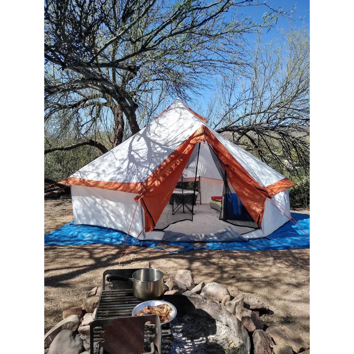 Burnt Corral Campground offers a tranquil escape for those looking to immerse themselves in the natural beauty of Tonto National Forest. With a modest $12 day-use fee and conveniently located camp spaces, visitors can enjoy the serene surroundings at an affordable price. The accessible dirt roads leading to the campground provide an element of adventure without deterring those pulling smaller trailers.

Visitors can expect a warm welcome from the amiable camp hosts who contribute to the friendly atmosphere of the campground, especially during the quieter months such as December. The calm and scenic environment offers a bounty of bird-watching opportunities, and with the chance of a gentle rain, there is an added sense of freshness and peace to the area.

Seamlessly blending into the beautiful lakeside setting, Burnt Corral Campground presents ample opportunities for water enthusiasts. Without the need for hook-ups, campers can secure spots that are directly on or tantalizingly close to the water's edge, allowing for an idyllical lakeside experience. The proximity to a boat ramp makes it an excellent destination for those eager to indulge in water skiing or jet skiing on Apache Lake, known for its suitability for such activities due to its unique narrowness.

Burnt Corral Campground captures an essence of undisturbed nature, enhanced by the quietude of the lake compared to busier alternatives, and is surrounded by ongoing improvements that promise to enhance the visitor experience. The journey to reach this hidden gem might be filled with rugged thrills, but the destination itself rewards the intrepid traveler with its pristine landscapes and relaxing atmosphere, providing an enriching outdoor experience to all who visit. Remember to prepare for the brisk nights wherein the stars shine brightly over the peaceful campground, completing the perfect outdoor retreat for relaxation and adventure. Description by ChatGPT.