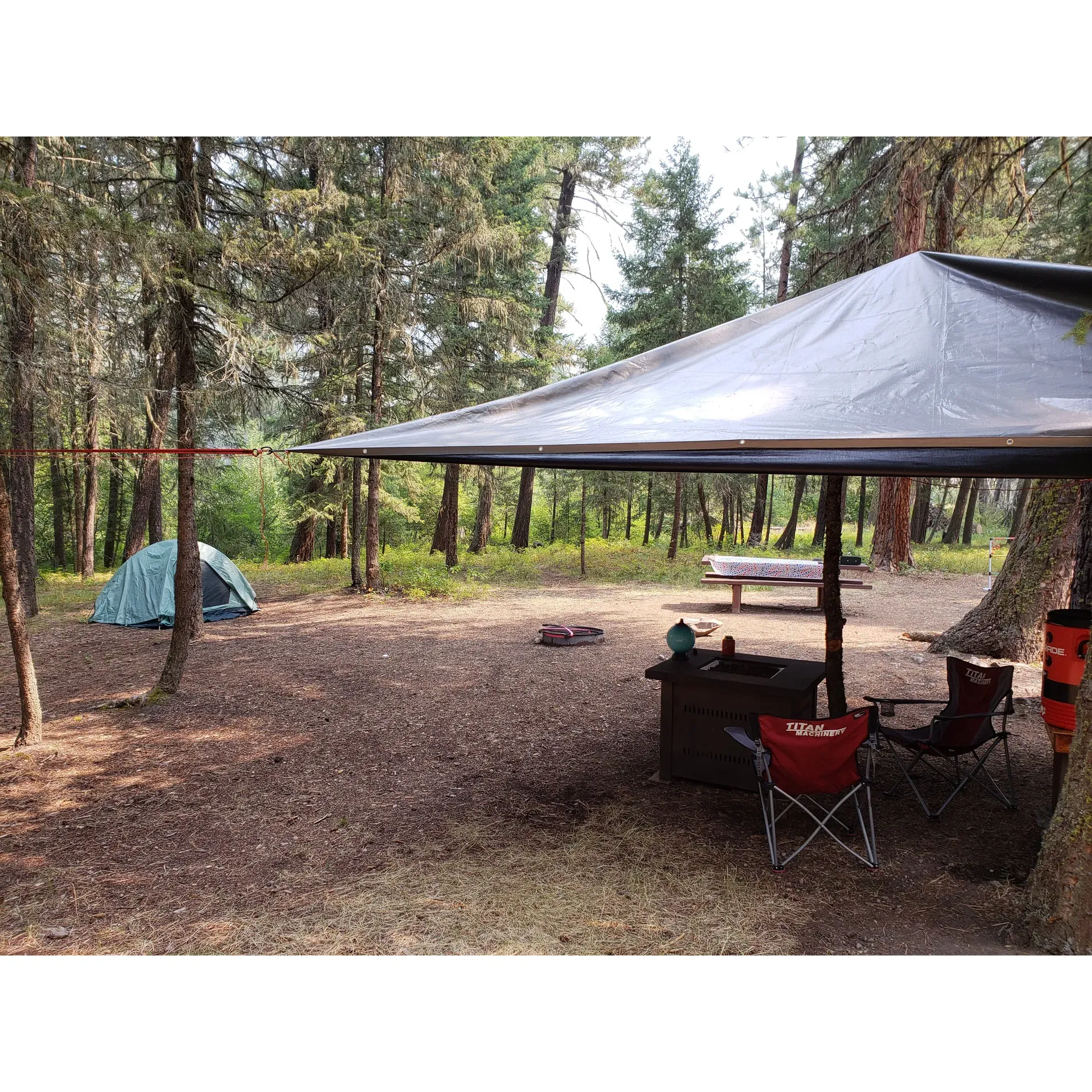 Grizzly Campground emerges as a cherished retreat for travelers looking to soak in the tranquility of the great outdoors. The idyllic setting allows for a serene escape, where visitors can park their class C vehicles and set up camp in an environment that is not only well-maintained but also exudes an air of pristine cleanliness. Campers revel in the available amenities, including multiple spotless pit toilets stocked with essentials, ensuring a comfortable stay even amidst nature's simplicity.

The allure of Grizzly Campground is heightened by the playful chipmunks that enhance the natural vibe, and the mesmerizing river that serves as both a stunning visual backdrop and a soothing auditory experience. Fishing enthusiasts appreciate the opportunity to cast their lines into Ranch Creek, known for its great fishing prospects, topping off what is already an authentic outdoor adventure.

Ample space between well-appointed campsites offers privacy and the sense of having a personal slice of wilderness. The rendezvous with nature doesn't end at dusk, as the absence of light pollution unveils a canopy of stars, offering a celestial show that promises to captivate stargazers and create unforgettable memories.

For both RV and tent campers, Grizzly Campground serves as an excellent base while exploring the surrounding areas, including the picturesque Rock Creek. Acknowledging the efforts of the dedicated forest service employees, the beautifully kept campground rates highly among those who've encountered its simple charm. Grizzly Campground invites guests to step away from the everyday bustle and indulge in the peaceful, starlit embrace of Montana's natural beauty. Description by ChatGPT.