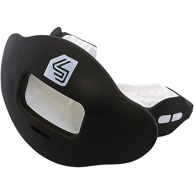 The Shock Doctor Max Airflow 2.0 Lip Guard/Mouth Guard is a high-quality, durable mouthguard designed for both youth and adult football players. It features a breathable wide opening mouthpiece that allows for maximum airflow during intense gameplay, helping to increase comfort and performance on the field.
