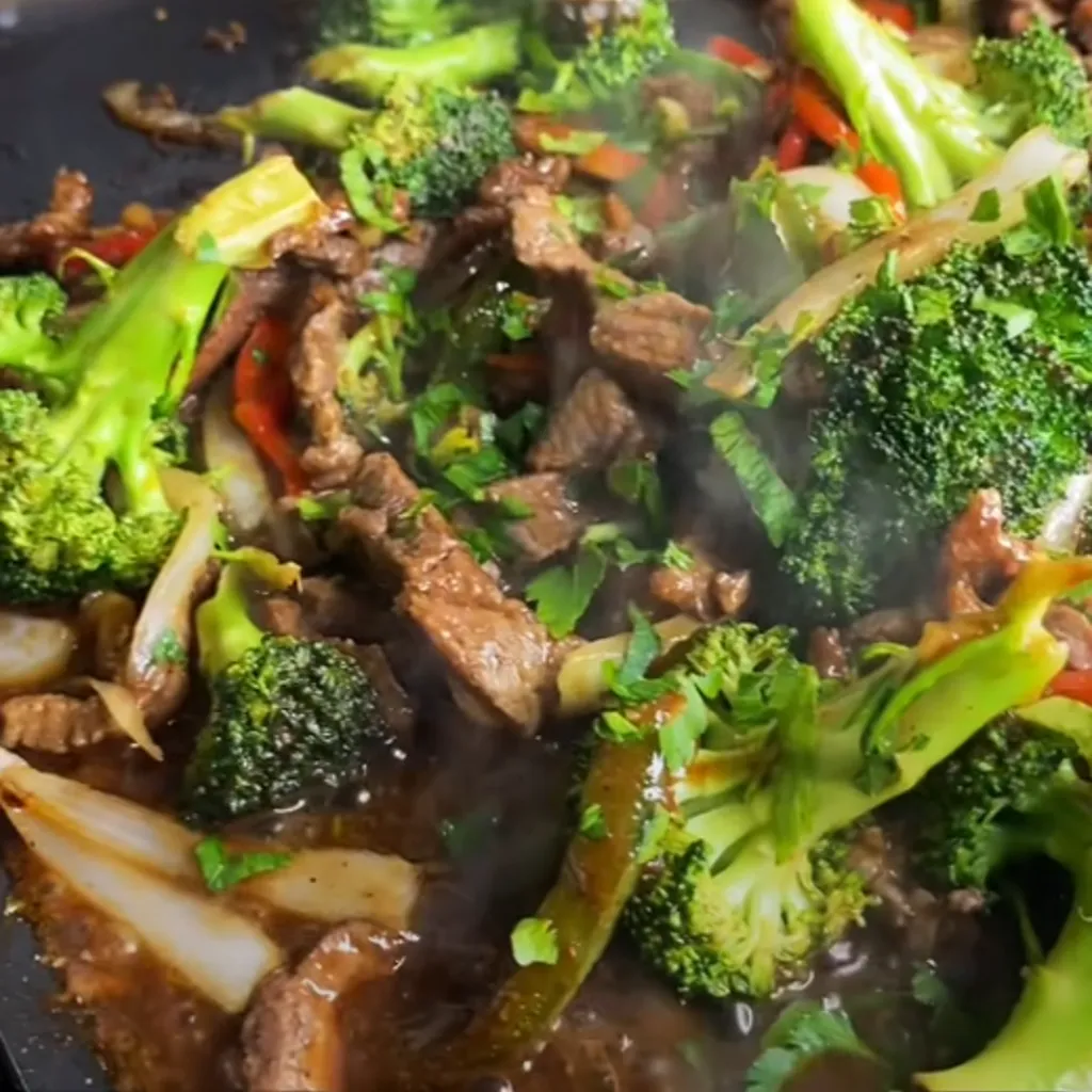 Delight in this quick and easy keto-friendly Pepper Steak Stir-Fry, an Asian-inspired dish featuring tender beef slices, vibrant bell peppers, onions, garlic, and broccoli. All enveloped in a savory blend of sauces that guarantees to satisfy every time. Perfect for a healthy and flavorful meal that fits a keto diet.