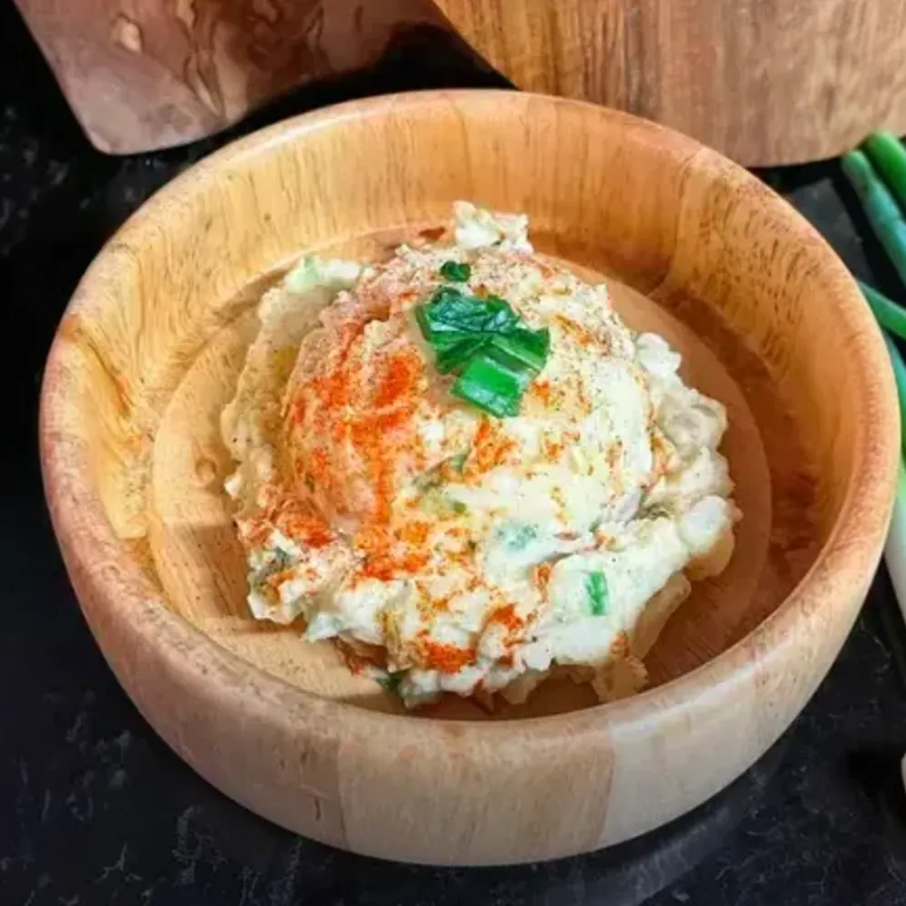 This Classic Cajun Potato Salad is a delectable southern comfort dish that comes to life with its smooth and creamy texture, spiced up by Cajun seasoning. The salad, enhanced with vibrant flavors, is perfect for any occasion, from a casual cookout to a festive event.
