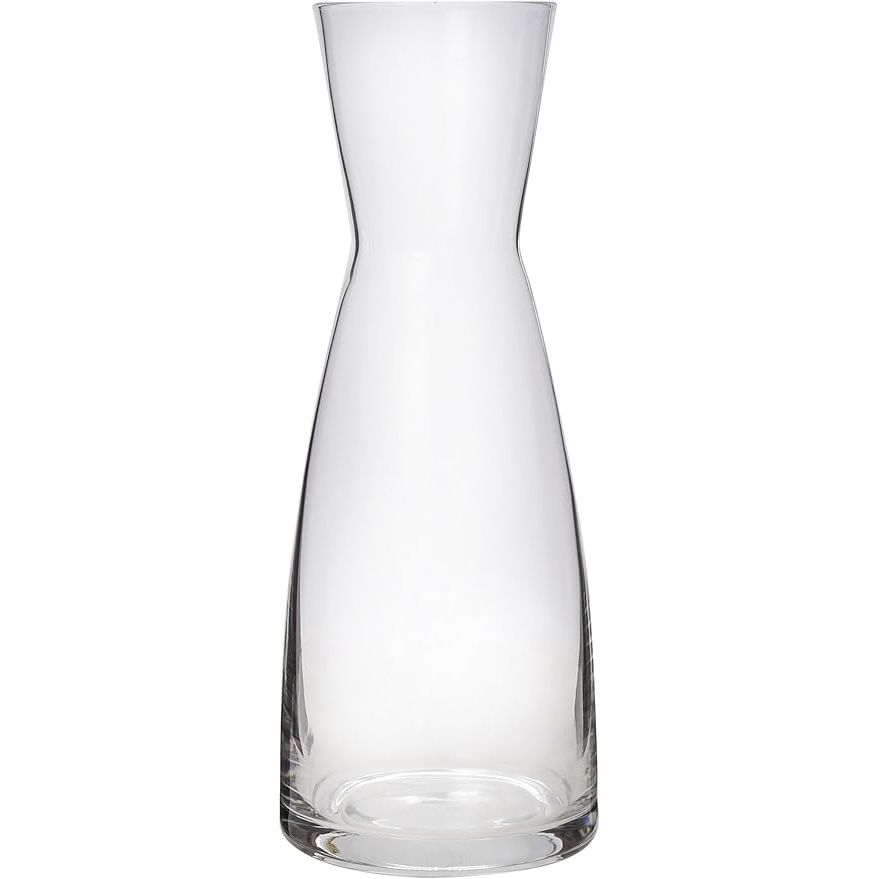 The Bormioli Rocco Ypsilon Wine Carafe is a stylish and elegant clear glass carafe designed for serving water, juice, milk, coffee, and iced tea. With a wide mouth for easy pouring and a 36.5 ounce capacity, this carafe is perfect for both restaurants and home use.