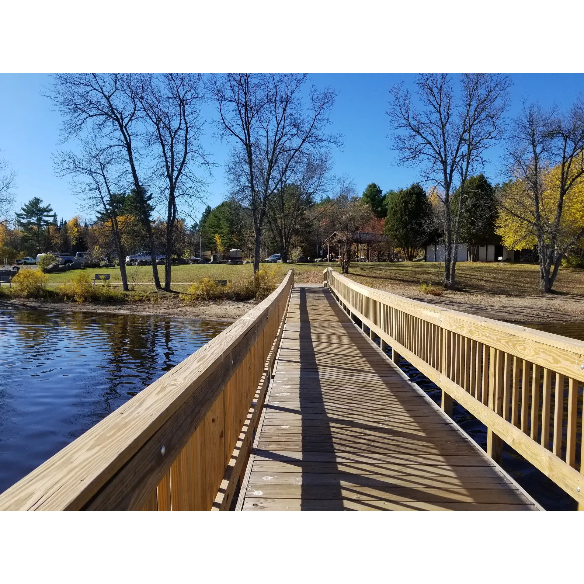 Biwabik Campground on Vermilion Trail offers a serene and idyllic retreat for nature lovers and outdoor enthusiasts. Visitors can soak up the tranquility of the region while enjoying modern amenities and the natural beauty of this historical locale, which has been thoughtfully updated to enhance the guest experience. The addition of a new viewing dock and updated shoreline replete with benches affords magnificent vistas and a perfect spot to unwind.

This scenic campground boasts a variety of recreational activities suitable for the entire family. Guests can plunge into the calm lake waters for a refreshing swim, cast a line for an afternoon of fishing, or paddle through the gentle waves in a canoe. Watercraft enthusiasts will appreciate the inclusion of a boat dock. With dedicated areas for different activities, the campground ensures a harmonious blend of excitement and peaceful relaxation, even during peak times.

The thoughtful layout encompasses both open areas and secluded wooded sites, catering to every camper’s preference for sun or shade. Each campsite is a private haven allowing guests to feel at one with nature. Proximity to a nearby town means essentials are always within reach, while the adjacent main road provides convenient access to Giant's Ridge Recreation area and beyond.

Biwabik Campground also serves as an enchanting backdrop for special events, with its picturesque surroundings offering an unforgettable setting for celebrations. Attention to guest comfort is evident with clean and spacious restroom facilities and welcoming trails that link the various parts of the campground.

Praised for its responsive and amiable staff, Biwabik Campground promises a personal touch to your outdoor adventure. Whether you're seeking a brief respite on a road trip or planning a multi-night stay, this charming campground invites you to discover its unspoiled beauty and local hospitality, ensuring a delightful and memorable experience in Minnesota's majestic "Land of Lakes." Description by ChatGPT.