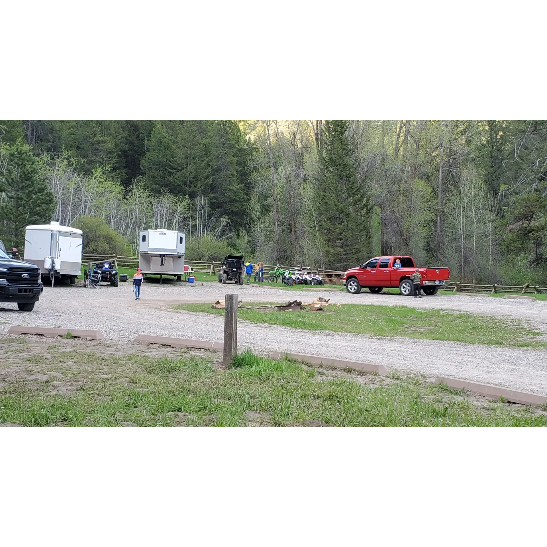 Table Rock Campground is an idyllic retreat for large group gatherings, comfortably accommodating a cadre of 40-60 outdoor enthusiasts. This serene haven, enveloped by enchanting forested mountains, invites you to an immersive nature experience where the air is pure and the surrounding vistas are breathtaking.

The campground provides ample open space designed to welcome numerous tents, giving everyone the freedom to establish their cozy outdoor havens. Additionally, the site is equipped to host a select number of campers and trailers, up to a maximum length of 20 feet, ensuring that even those who bring their portable abodes are catered to in line with the campground's thoughtful policies.

Cleanliness is paramount at Table Rock Campground, and this is evident in the well-maintained restroom facilities that offer a touch of comfort in the midst of the wilderness. Although the campground operates as a dry site, which means that there is no water or electric hookups, this minor detail perfectly complements the rustic ethos and encourages a more authentic camping experience.

For outdoor enthusiasts ready to explore, the campground is a gateway to a cornucopia of picturesque hiking trails that crisscross the nearby landscapes. Adventure seekers can find solace in the gentle murmur of the nearby creek, adding a soothing soundtrack to any camping stay. When the sun sets and the stars come out, the campground's seclusion from main roads ensures a tranquil environment where the bustle of passing traffic is a world away.

While the absence of shade-providing trees calls for creative cooling solutions during summer retreats, this openness also presents an unobstructed view of clear, starry nights, fostering memorable moments around the campfire with friends and family.

Eco-conscious practices at Table Rock Campground encourage campers to embrace a leave-no-trace ethos, bringing their own supplies as needed, such as trash bags, to ensure that the natural beauty of the area is preserved for fellow adventurers and future generations. A minimal camping fee is a small price to pay for the privilege of staying in such an enchanting location, where the everyday melts away, and nature's embrace is all-encompassing. Description by ChatGPT.