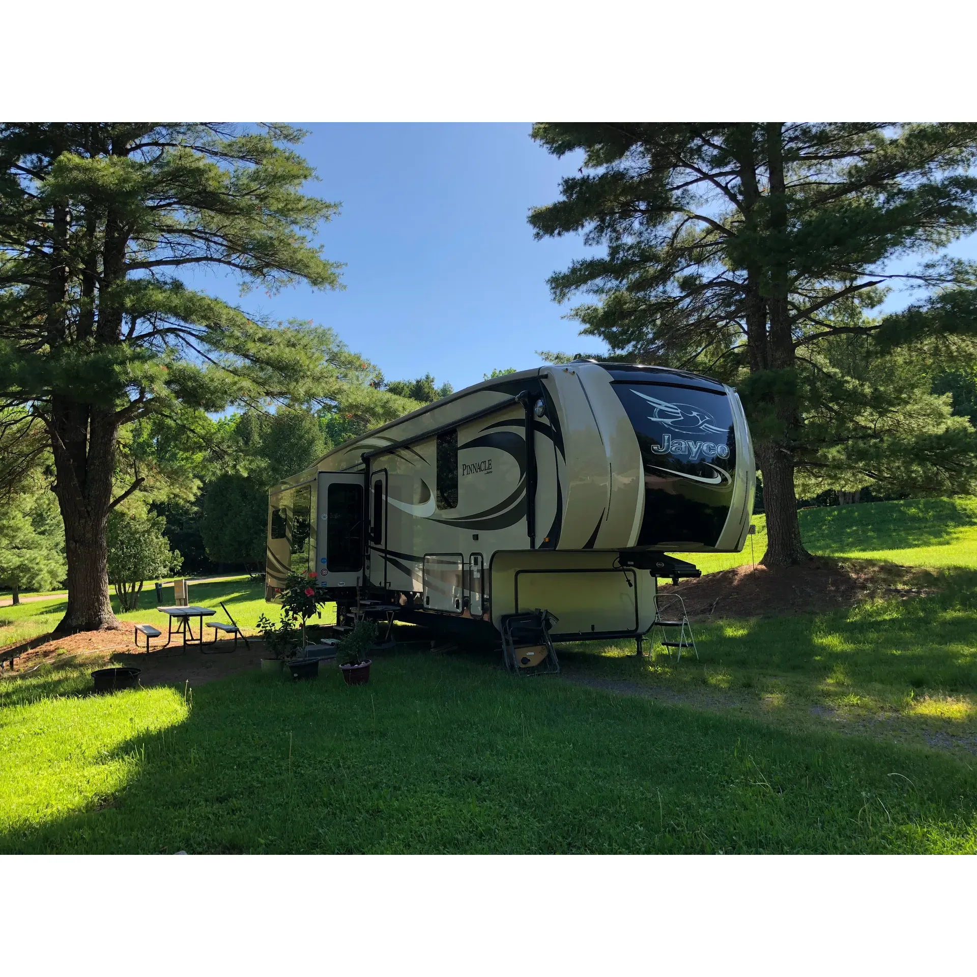 Apostle Islands Area Campground offers an idyllic outdoor getaway with a variety of accommodations tailored to provide comfort amidst the natural beauty of the surrounding landscapes. Perched on a hill, the campground affords guests panoramic views with its creatively terraced pull-through sites, amplifying the outdoor experience. Guests can appreciate the quietude that envelops the park at night, ensuring a peaceful stay after a bustling day of activities.

Conveniently located, the campground provides easy access to the charming downtown area of Bayfield, along with quick routes to nearby attractions and the highway. The family-friendly campground hosts a plethora of activities, guaranteeing entertainment for visitors of all ages. Whether you're looking to refresh your spirits or engage in fun, this campground does not disappoint.

The campground has thoughtfully placed laundry facilities for guest convenience, ensuring that your outdoor adventure does not come at the cost of comfort. The highlight of the services provided includes immaculate and inviting shower and bathroom facilities that offer an abundance of warm water, perfect for a soothing end to an action-packed day.

The staff is renowned for their superlative friendliness and commitment to guest satisfaction, bolstering the overall welcoming atmosphere of the campground. On-site, a small shop caters to the immediate needs of campers, from sundries to essential camping items, further elevating the ease of your stay.

Family bonding and creating memories is seamless here, with shaded sites like the picturesque Site 28, offering a tranquil retreat for families, even on busier weekends. Moreover, the campground boasts a pristine swimming pond and a quirky mini-golf setup that adds a splash of fun to your visit.

For those seeking a unique lodging experience, the campground's themed cabins are masterpieces in their own right, offering a unique and artistic abode for those who wish for a little extra comfort while immersed in nature.

Apostle Islands Area Campground is a testament to a great outdoor hospitality experience, with its pristine conditions, host of amenities, jovial ambiance, and an unwavering focus on ensuring that each stay is exceptional, fittingly reflected in their glowing 10/10 endorsements from satisfied visitors. Description by ChatGPT.