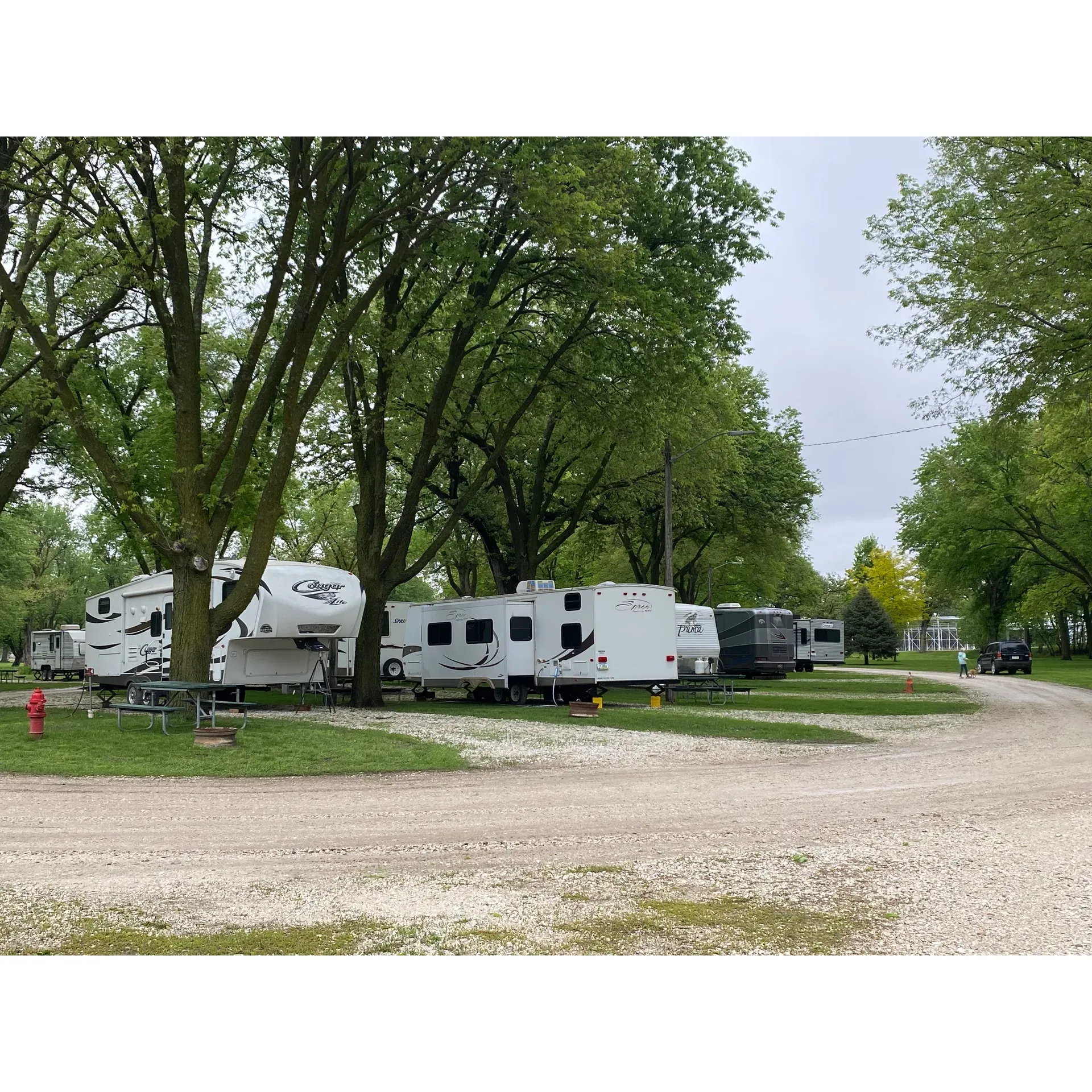 City Park Custodian / Riverview Campground offers an idyllic and budget-friendly outdoor experience, with the picturesque river providing a serene backdrop for campers. At the competitive rate of just $17, guests are treated to scenic spots complete with the convenience of electricity and the option of potable water. The tranquil ambiance ensures a peaceful night's rest, and with a leisurely checkout time of 1pm, visitors are afforded a relaxed departure without the typical morning haste.

The grounds themselves are maintained with care, ensuring all the necessary amenities for a comfortable stay. Campers can find solace and relaxation beside a delightful roaring stream at the south side of the camp, which adds to the site's natural charm. The courteous and accessible custodian ensures that everyone's needs are met, contributing to a welcoming and friendly atmosphere.

For those seeking refuge under the canopy of trees, the campground boasts clean, shady, and spacious sites that are perfect for pitching a tent. With a clean bathhouse and operational showers, regular visitors, including cross-country motorcyclists, find City Park Custodian / Riverview Campground to be a reliable and refreshing stop.

In instances of unexpected assistance, the campground manager and their network are known for their helpfulness, adeptly addressing even mechanical RV issues that might arise. This level of attentive service has left many guests vowing to return.

Overall, City Park Custodian / Riverview Campground presents a simple yet beautiful setting for campers, where cleanliness and a light-hearted community spirit reign. Even though reservations are not available and payments are limited to cash or check, the charm of the location, combined with its affordability and the cleanliness of the site, has endeared it to many who have enjoyed a fuss-free, enjoyable stay by the river. Description by ChatGPT.