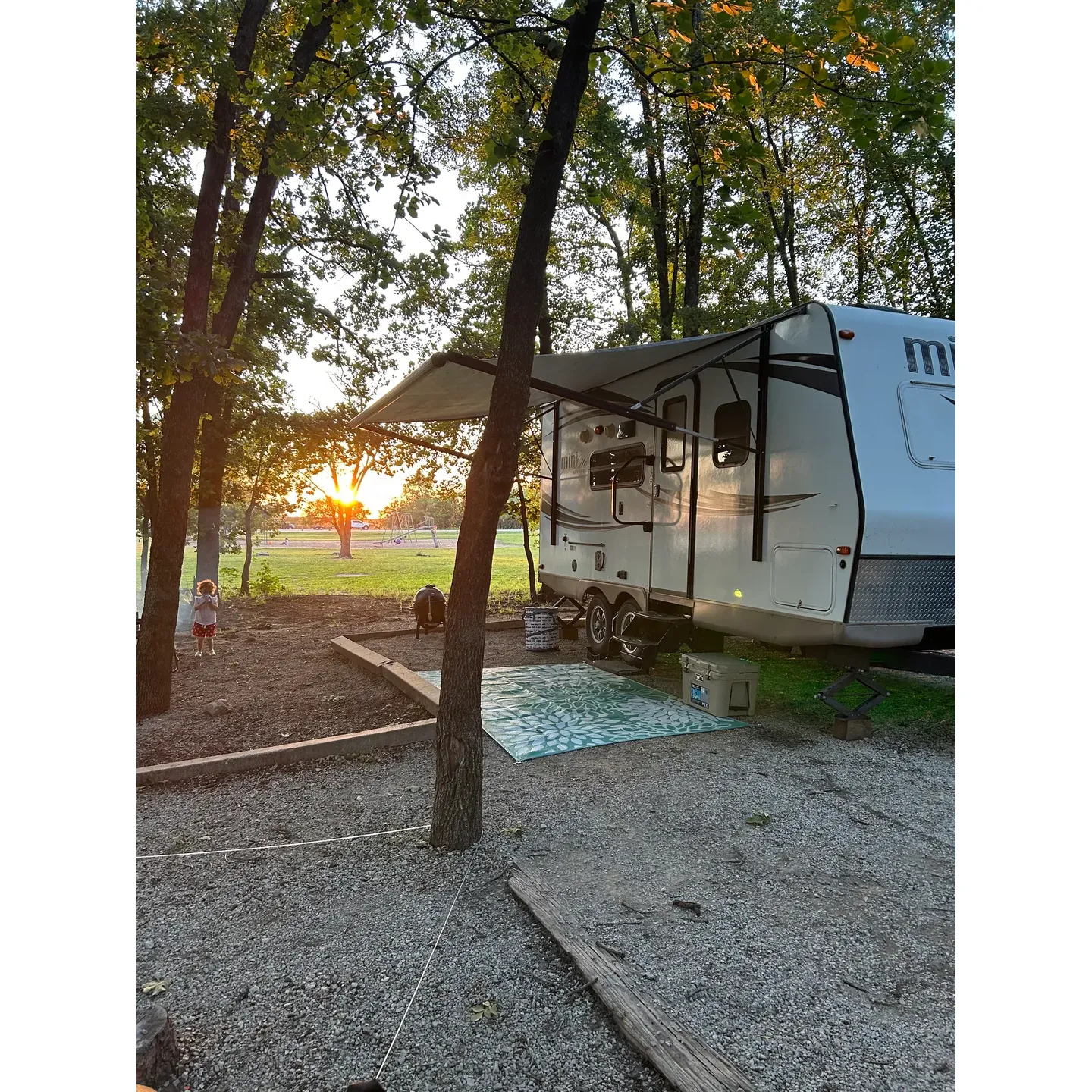 Sarge Creek Campground emerges as a tranquil retreat for outdoor enthusiasts looking to immerse themselves in the serenity of nature. Boasting scenic vistas and a peaceful ambiance, this campground is lauded for its well-maintained facilities and friendly, attentive staff who ensure visitors have a comfortable stay.

Campers can look forward to spacious gravel-padded RV spots equipped with 30-amp hookups and water access, complemented by picnic tables, grills, and fire pits for a complete outdoor experience. While enjoying the convenience of these amenities, guests are advised to come prepared with extra hose length for ease of connection. Additionally, various sites offer a unique stand-up bar feature, enhancing the outdoor social environment.

Recreational activities abound here, with a playground that features swings, a slide, and monkey bars set upon a sandy surface, providing a safe and enjoyable space for children to play. For those seeking aquatic adventures, the campground's sandy beaches present an idyllic setting for swimming, while the region is also highly regarded for its excellent fishing opportunities. Kayaking enthusiasts will find the calm waters to be perfect for paddling and relaxation.

The campground boasts pathways lined with paved roads throughout the premises, maintaining accessibility and a touch of modernity amidst the wilderness. Two shower houses are available for guest use, ensuring cleanliness and convenience, while the bathhouses are strategically placed throughout the area to serve patrons. Furthermore, the presence of a boat ramp and dock add to the allure for boating aficionados.

Visitors can find solace under the canopy of great shade in the middle and last campground loops, while sun-seekers may prefer the openness of the first loop by the water. Several sites offer a sense of seclusion for those who cherish privacy, making it a perfect setting for a tranquil retreat. The campground achieves a balance between communal living and private getaway, catering to a diverse array of preferences.

Lastly, impeccable cleanliness and the spirited welcome provided by the campground staff ensure that every guest's visit is met with the highest standard of hospitality. Sarge Creek Campground prides itself on delivering a stellar camping experience where memories are made, and moments of relaxation are treasured. It's a destination that promises to capture the heart of any traveler looking to bask in nature's splendor. Description by ChatGPT.