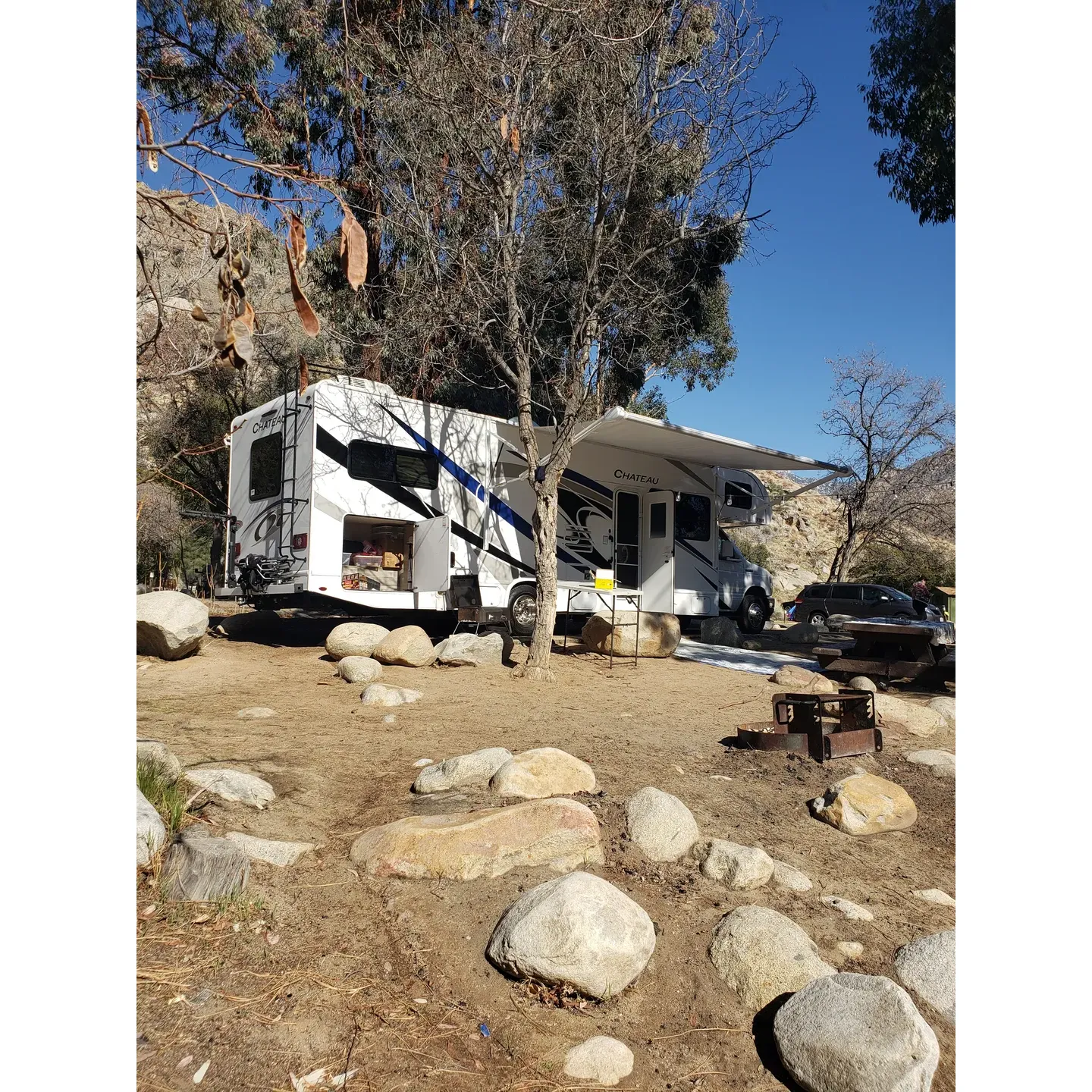 Headquarters Campground offers an idyllical retreat for outdoor enthusiasts seeking an intimate connection with nature. Graced by the tranquil presence of the Kern River, this campground provides a serene backdrop for both group and solo adventurers. With ample space for tent sites, it comfortably accommodated a party of 17 across three sites, showcasing its capacity to host large gatherings.

Visitors commend the exceptionally clean and well-maintained vault toilets, a pleasant surprise for those accustomed to less agreeable facilities. The convenient location of water stations nearby the campsites adds to the thoughtful layout of the campground. Tranquility reigns supreme during the night, with the natural sound of the river creating a soothing soundscape that ensures restful sleep.

Bear boxes on site are well-maintained, offering peace of mind for campers conscious of wildlife. RV campers can also find solace here, with some sites accommodating up to 30-foot RVs, including room for accompanying vehicles. The campsite hosts are known for their friendliness and helpfulness, readily offering information on generator usage outside of designated quiet hours.

While the campground maintains a focus on tent camping, the RV sites, though limited, provide just enough space for a comfortable stay. Generous site proportions compensate for the limited shade in some areas, and the proximity to the road is mitigated by the communal spirit around the campfire during the evening. 

Anglers and water enthusiasts will delight in the proximity to the Kern River, renowned for its rainbow trout fishing. Connectivity may be limited, but this becomes an insignificant detail amidst the splendor of star-filled skies and the natural beauty of the surroundings. The area is recovering gracefully from natural events, a testament to the resilience and dedication of the campground management. 

With year-round accessibility, Headquarters Campground shines as a versatile destination. Just a stone's throw away from Kernville, campers can enjoy local amenities, including a nearby store offering an array of products and mouthwatering tri-tip sandwiches, perfect after a day of exploration or fishing. The campground continues to attract loyal visitors over the years, drawn by its beauty and the warm memories made along the banks of the Kern River. Description by ChatGPT.