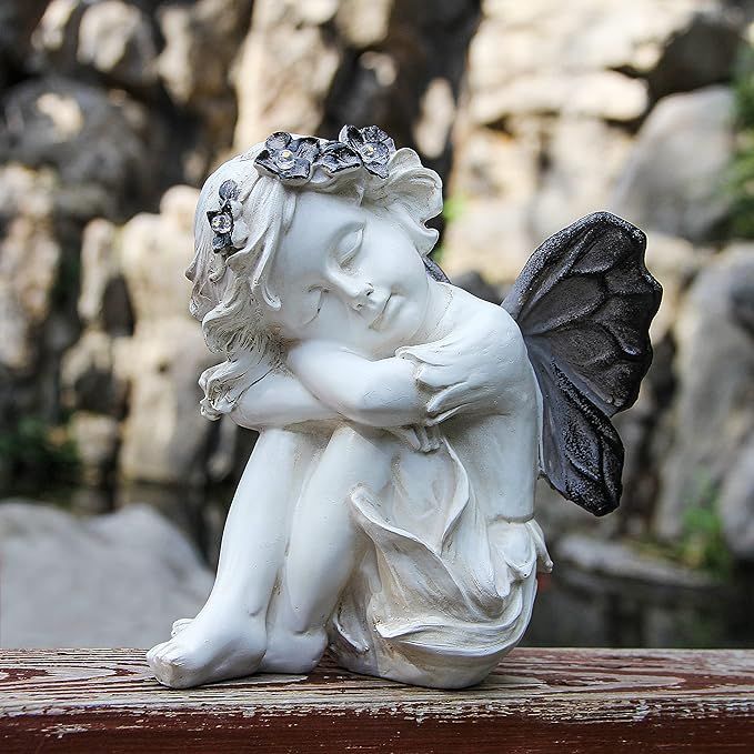 The Leekung Angel Statue with Solar Powered Light is a stunning addition to any garden or outdoor space. This intricately designed angel sculpture features a built-in solar panel that powers a soft, glowing light to illuminate your garden at night.