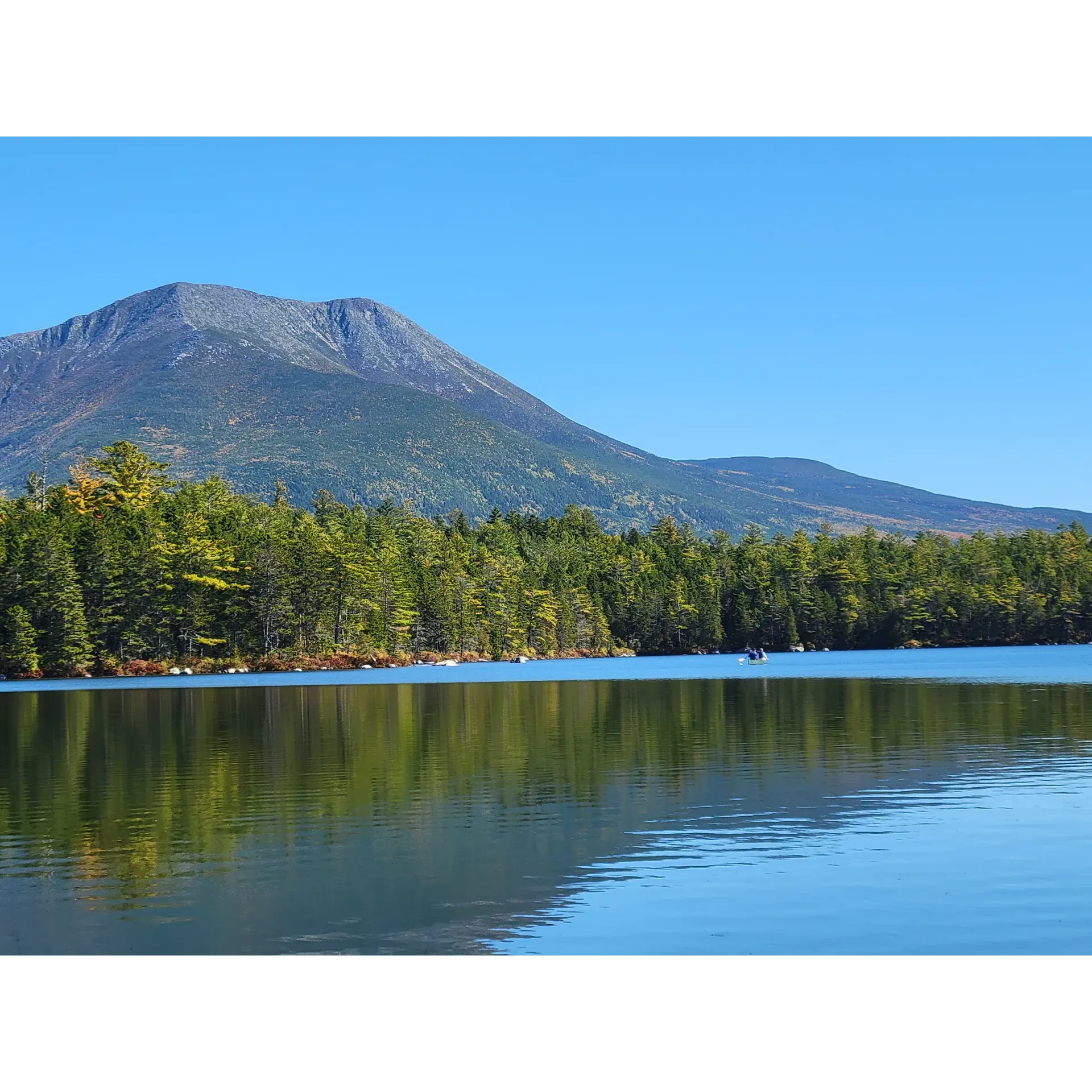 Daicey Pond Campground offers a serene retreat in the heart of Baxter State Park, presenting an idyllic escape for nature lovers and outdoor enthusiasts alike. Guests can look forward to an authentic rustic experience, with the availability of charming cabins from mid-May to mid-October. The campground is a beacon for tranquility and disconnection, inviting visitors to leave behind the bustle of modern life and immerse themselves in the unspoiled wilderness.

The region boasts a picturesque landscape accentuated by the majestic Mount Kathadin, with its breath-taking views serving as a backdrop for an array of trails catering to all levels of hikers. Whether you are a family venturing out with small children or an experienced hiker seeking new trails, the variety of pathways ensures there's something to suit everyone's adventure needs.

A unique highlight of Daicey Pond Campground is the delightful little library, a cozy spot where visitors can unwind and enjoy their lunch while taking in the vistas. This amenity, offered free of charge, adds a thoughtful touch to the visitor's experience, making it memorable and appreciated.

The campground has garnered a reputation for its cleanliness and the wholesome fun it offers. The friendly and responsive park rangers contribute to the warm atmosphere, ensuring guests have a comfortable and enjoyable stay. Regular visitors, some frequenting the campground annually for over a decade, testify to its allure and the exceptional quality of service provided.

Daicey Pond Campground is not just a destination; it's a tradition for many, a spot where memories are made, adventures are had, and the natural beauty of Baxter State Park can be savored in its purest form. With future enhancements on the horizon, the promise of even better experiences beckons travelers to this enchanting sanctuary in the wilderness. Description by ChatGPT.