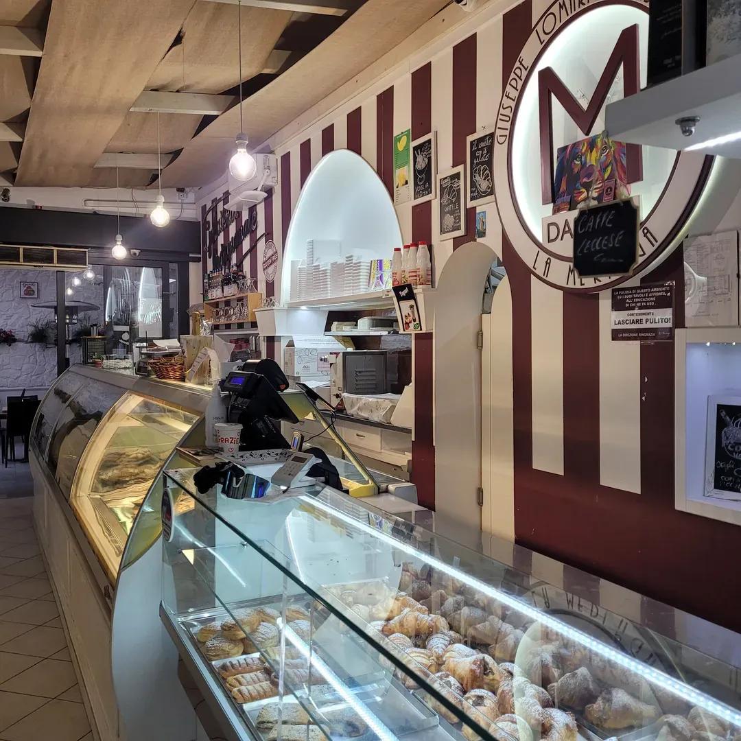 Gelateria La Meringa is a delightful ice cream paradise serving taste sensations that cater to the palates of both locals and visitors in Campomarino. Known for its extraordinary array of delectable treats, this gem offers an unforgettable culinary experience, all in a cozy and welcoming atmosphere. Patrons rave about the 'Sapori di Sicilia' and 'Cioccolato Nero', two of the standout flavors that pair wonderfully with a robust caffè doppio, providing an exquisite treat that more than makes up for any day cut short by inclement weather.

Not only does Gelateria La Meringa craft exceptional ice cream, including a highly praised cream flavor considered a rarity in the region, but they also excel in baking. Their brioches and croissants exude a fragrance, scent, and lightness that is unparalleled, while the pasticciotti, especially the variant filled with custard and San Marzano Elixir, are praised as truly excellent.

In addition to their frozen treats and baked goods, the bar serves up delectable sweet crepes in the evening that are not to be missed. Guests can choose to savor their delicious treats on an inviting outdoor terrace or within the lovely adjacent room, adding an element of ambience to the indulgent experience.

While the staff may be described as young and reserved, they are universally appreciated for their kindness and the charming service they provide. Whether you're a connoisseur of fine ice creams, a lover of freshly baked pastries, or someone who simply appreciates quality ingredients masterfully combined, Gelateria La Meringa promises a culinary adventure that is both enchanting and deeply satisfying. It stands as a beloved establishment whose flavorful offerings are enthusiastically encouraged for all to try. Description by ChatGPT.