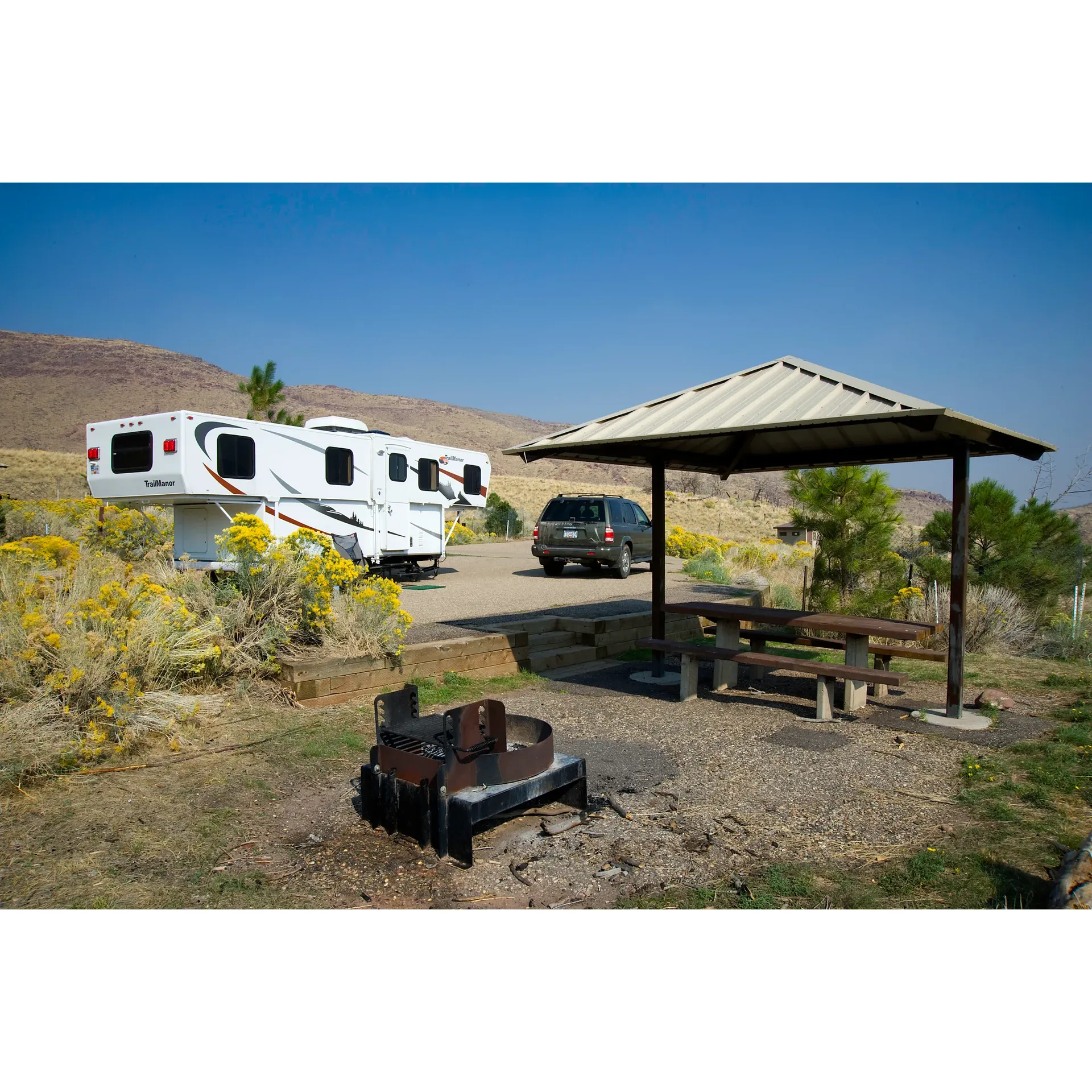 Dripping Springs Campground in Utah emerges as an exemplary outdoor retreat for those who cherish immaculate natural beauty and hospitable service. It serves as the perfect access point or home base for adventure-seekers heading to the popular Little Hole put-in, offering a seamless entry into nature's embrace. Visitors rave about the sparkling cleanliness of the facilities: the restrooms are not only spotless but also pleasantly freshened with air fresheners, a detail that does not go unnoticed by appreciative guests.

The campground is further complimented by the presence of engaging and friendly hosts who are on-hand to ensure every visitor's experience is comfortable and enjoyable. Stories of their kindness and helpful demeanor are a common thread across reviews, with one host, Lee, earning special recognition for his outstanding hospitality that keeps guests returning year after year.

Guests can enjoy the convenience of purchasing firewood directly on-site, ensuring cozy nights around the campfire without any hassle. Each site is thoughtfully equipped with shelters, tables, grills, and fire rings, inviting campers to settle in and soak up the tranquil surroundings. The provision of potable water and the awe-inspiring views that greet every glance add to the appeal.

Dripping Springs Campground distinguishes itself with ample individual privacy as the sites are separated by sufficient vegetation, offering a serene and personal camping experience. While the echoes of a past fire are visible in the landscape, it is precisely this rugged beauty that captivates visitors, creating a sense of seclusion and wilderness adventure just a stone's throw from local amenities.

With a reputation for meticulous maintenance, the campground welcomes both planned and spontaneous visitors. However, as its popularity grows, many recognize the benefit of securing reservations to guarantee their spot in this cherished natural haven. Whether seeking a peaceful retreat or an outdoor adventure, Dripping Springs Campground stands out as a treasured locale that captures the essence of Utah's scenic allure and embodies a warm, welcoming spirit. Description by ChatGPT.