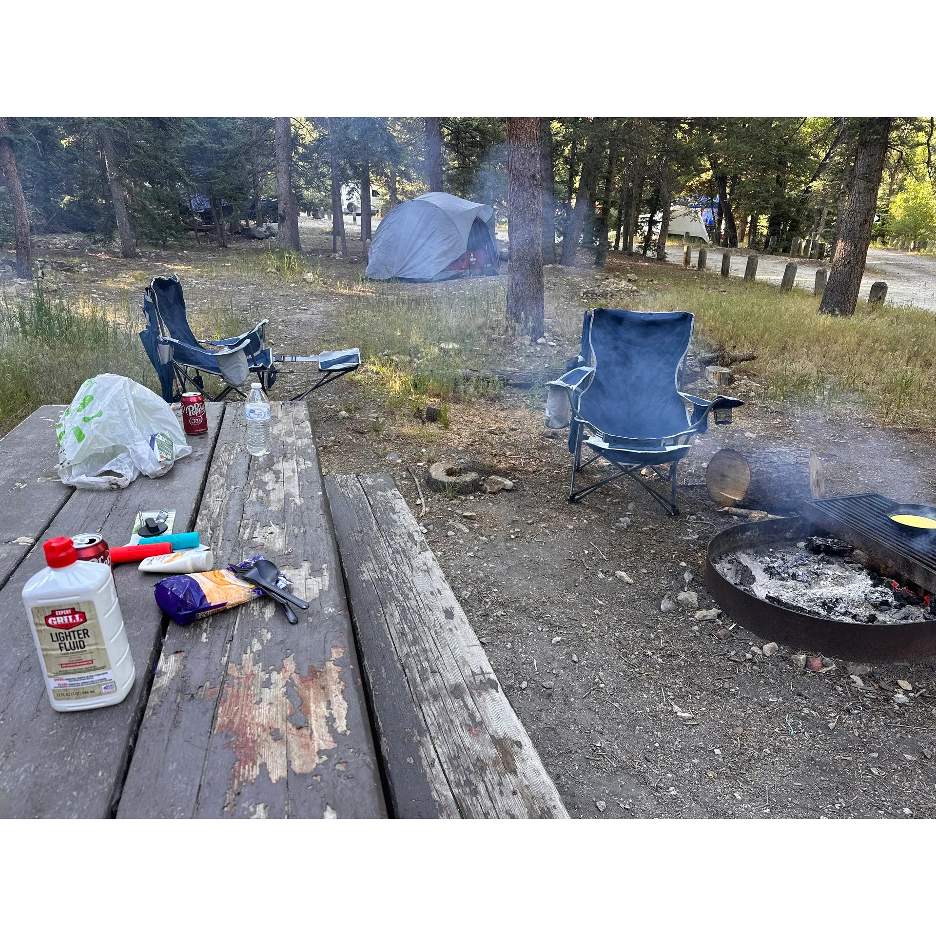 Junebug Campground offers a serene retreat that appeals to nature lovers and outdoor enthusiasts alike, providing an immaculately maintained landscape that allows for spacious and tranquil camping experiences. With ample room for multiple tents, the campground ensures privacy and comfort, a welcome change from the proximity usually found at more crowded sites.

The affable host on-site enhances the camping experience with excellent service, ensuring that every guest feels welcome and attended to. The gentle sounds of the adjacent creek create a soothing nighttime ambiance, perfect for a restful sleep under the stars.

At an affordable rate of $22 per night for tent camping, the sites are deemed a steal for the quality and space provided, with firewood available for purchase to complete the classic camping experience. The vault toilets are exceptionally clean, ensuring the necessary amenities do not detract from the natural beauty of the surroundings.

Anglers will be delighted to find that they can reel in rainbow trout right from their campsite, while the close proximity to the town of Red River offers quick access to additional supplies and leisure activities. The campground also doubles as a day-use area with a reasonable $10 fee, inviting daytrippers to indulge in picnicking amongst the picturesque landscape where majestic wildlife sightings are not uncommon.

The entire area, rich with lustrous quartz rocks and vibrant natural wildlife, provides an enchanting backdrop for hiking, exploring, and simply soaking in the beauty of the environment. Hummingbirds flit through the air, adding to the magical feel of the Junebug Campground and ensuring that every visitor leaves with memories of a peaceful and fulfilling outdoor adventure. Description by ChatGPT.