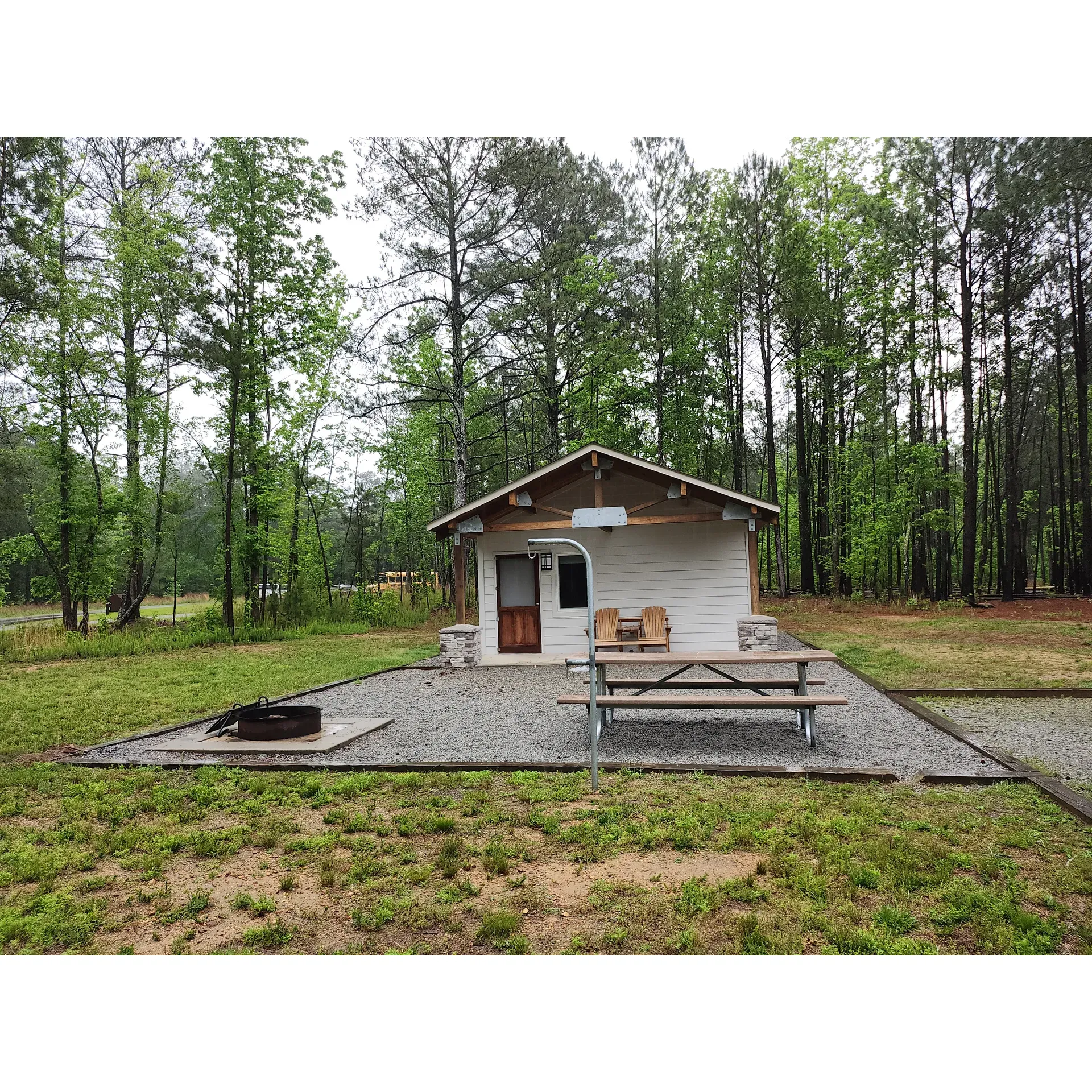 Raven Rock State Park Campground welcomes outdoor enthusiasts with its beautifully developed camping facilities, offering an experience that combines comfort with the rustic charm of the wilderness. The campground boasts an array of accommodations to suit different preferences, including cozy cabins that come fully equipped with queen-size beds, wooden bunk beds, and the practicality of a concrete floor for effortless cleaning. For your convenience, each cabin provides modern amenities such as electricity, heating, air conditioning, and ceiling fans to ensure a pleasant stay regardless of the weather.

Upon arrival, guests receive a personalized unlock code for the electronic locks, adding an extra layer of security and privacy to the experience. The proximity of water access points and trash receptacles contributes to the well-maintained environment of the campground. Guests have access to a pristine bathhouse that receives attentive cleaning services twice daily, underscoring the staff's commitment to excellence in facility upkeep.

Each campsite includes a gravel driveway, a fire ring perfect for gathering around and cooking up campfire meals, and a double-hook lantern pole to illuminate the evenings under the stars. Additional comforts include two Adirondack chairs per site, conveniently positioned beneath an overhang for sheltered relaxation.

The campground also fosters a friendly community atmosphere, assisted by the presence of camp hosts who are available to ensure your stay is comfortable and enjoyable. In addition to checking on guests, they provide a convenient firewood service, delivering it right to your campsite upon purchase.

Guests regularly commend the campground for its spaciousness and privacy, creating a serene and restorative environment that's perfect for both quick weekend getaways and longer outdoor adventures. The tent sites are meticulously maintained, striking the perfect balance between natural beauty and thoughtful landscaping. Park rangers are ever-present, providing a welcoming atmosphere from the moment you arrive and ensuring that assistance is on hand whenever needed.

The shower and restroom facilities are among the best you will find in a campground, reflecting a high standard of cleanliness and comfort. Acknowledged by seasoned campers as one of the finest experiences available, Raven Rock State Park Campground is the destination of choice for those seeking an unspoiled retreat with amenities that cater to a variety of camping preferences.

Whether you are enjoying your very first visit or returning for another memorable adventure, Raven Rock State Park Campground remains a highly recommended, well-maintained, and friendly destination for nature lovers and avid campers alike. Description by ChatGPT.