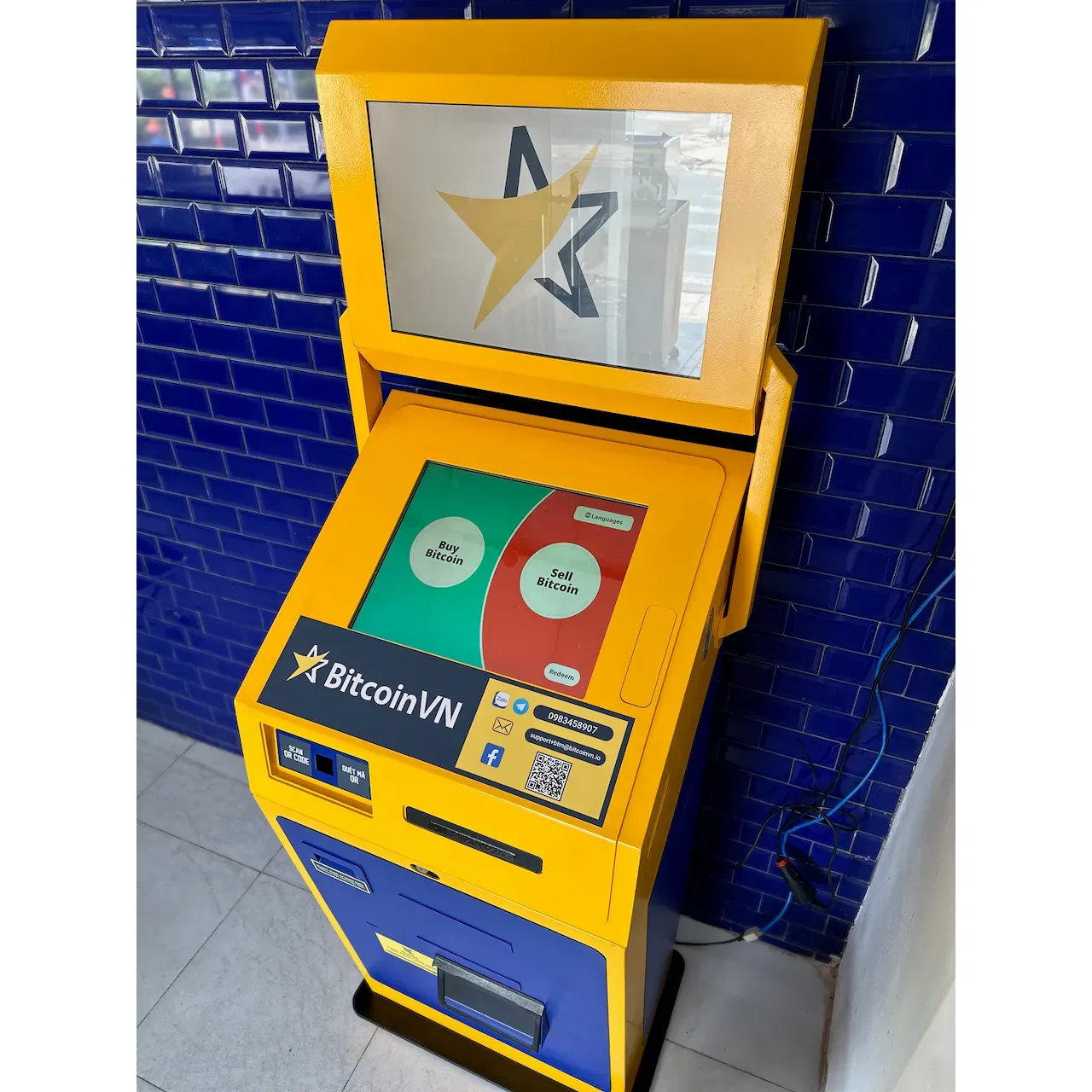 BitcoinVN is a leading company in Vietnam that provides Bitcoin ATM services. The Bitcoin ATM located at 21a Hùng Vương, Phú Cường, Thủ Dầu Một, Bình Dương, Vietnam allows users to buy and sell Bitcoin easily and securely. The ATM operates 24/7, providing convenience and accessibility to customers looking to exchange cash for cryptocurrency or vice versa.

BitcoinVN's ATM at the mentioned location offers a user-friendly interface, allowing individuals to quickly and easily complete transactions. The ATM supports different fiat currencies, making it convenient for international users to exchange their local currency for Bitcoin. Users can also access real-time exchange rates and receive a printed receipt for their transactions.

BitcoinVN's Bitcoin ATM at 21a Hùng Vương, Phú Cường, Thủ Dầu Một, Bình Dương, Vietnam is a reliable and trusted option for those looking to enter the world of cryptocurrency. With a secure and convenient location, customers can confidently buy and sell Bitcoin using cash with ease. The ATM provides a seamless experience for users seeking to engage in the growing world of digital currency. Description by ChatGPT.