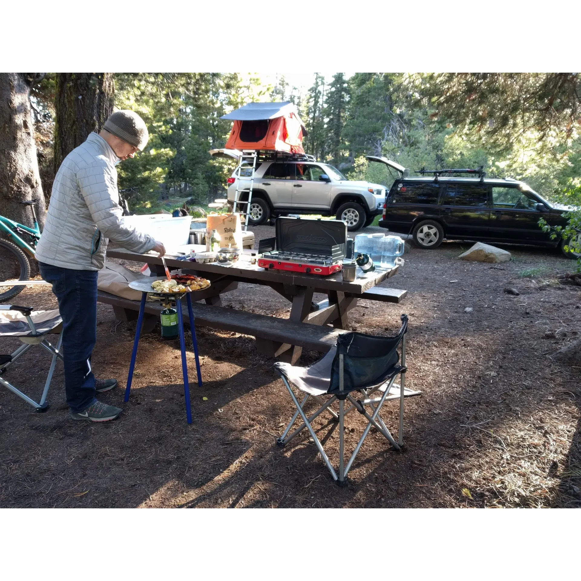 Lakes Basin Campground is a widely acclaimed outdoor destination lauded for its pristine conditions and exceptional natural beauty. Visitors frequently praise the cleanliness of the facility, which includes well-maintained vault toilets and potable water accommodations, ensuring comfort and convenience throughout their stay. The campground also boasts a dedicated and welcoming camp host, Steve, who is often mentioned for his friendliness and for providing amenities such as firewood for campers' enjoyment.

A hallmark of Lakes Basin Campground is the direct access it provides to a plethora of hiking trails. Adventurers and nature lovers can embark on excursions from their campsite or explore a multitude of trails that are just minutes away. These paths lead through stunning landscapes, offering breathtaking views and tranquil surroundings that captivate the senses and provide ideal photo opportunities.

Moreover, the campground is recognized for its beautifully laid-out spaces that enhance the camping experience. With the mesmerizing backdrop of crystal-clear lakes and panoramic vistas, it's no surprise that many visitors are eager to return for their next family camp or solo adventure. The ambient sounds of a gently flowing creek contribute to the serene atmosphere, allowing guests to unwind to the peaceful symphony of nature.

Whether seeking an idyllic base for hiking or longing for a scenic retreat to relish the great outdoors, Lakes Basin Campground comes highly recommended as a spot that promises both excitement and relaxation amidst the majesty of the wilderness. Description by ChatGPT.