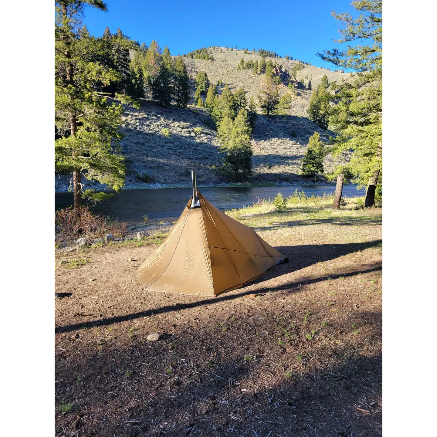 Lower O'Brien Campground offers visitors the chance to immerse themselves in the scenic beauty of the great outdoors along the picturesque Salmon River, providing an excellent setting for a tranquil retreat. This campground is perfect for those looking to enjoy traditional dry camping with the simplicity of nature as their backdrop.

Guests have access to fresh water from the upper campground to accommodate their needs, ensuring that basic amenities are conveniently within reach. The campground's facilities include modest but functional vault toilets, and the grounds themselves are well-maintained, offering a variety of single and double camping spots suitable for tents and small RVs. Additional parking is available on-site for extra vehicles which is a boon for groups or families traveling together.

With its proximity to the river, this gem of a campground is a haven for aquatic enthusiasts and nature lovers alike. The inviting waters near the campsite beckon swimmers and fishing aficionados to indulge in their passions, while the local wildlife, including the majestic sightings of bald eagles, adds an element of awe to the camping experience. The surrounding area also offers the allure of a nearby hot springs, just a mere 10-minute journey from the grounds, offering a chance to soak and unwind in nature's own spa.

The single-lane bridge and access road to the campground encourage a leisurely pace and mindfulness, allowing for a fully relaxed arrival as visitors take in the serene surroundings. Travelers are advised to manage crossing with care, as the bridge is shared with happy anglers and swimmers enjoying the gentle flow of the river. 

Whether seeking solitude in the early camping season or joining others in outdoor camaraderie during peak times, Lower O'Brien Campground promises a memorable and delightful escape for all who cherish the outdoors. With its warm welcome and prime location by the water, it's a delightful spot for a serene getaway. Description by ChatGPT.