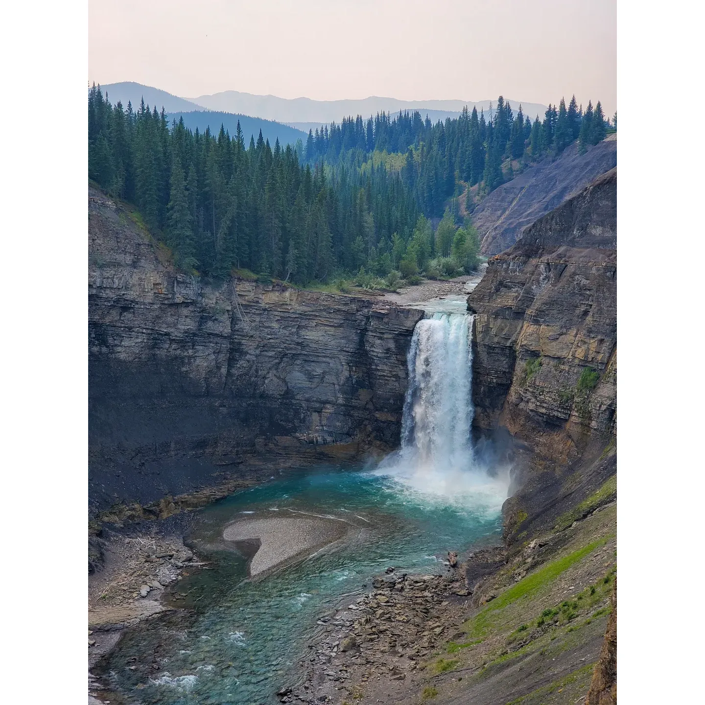 Ram Falls Provincial Park is a picturesque natural area located in Clearwater County, Alberta, Canada. The park is known for its stunning waterfall, Ram Falls, which cascades over 30 meters down a series of picturesque limestone ledges. The park offers breathtaking views of the waterfall and surrounding wilderness, making it a popular destination for hikers, photographers, and nature enthusiasts.

Visitors to Ram Falls Provincial Park can enjoy a variety of outdoor activities, including hiking, fishing, camping, and wildlife viewing. The park features a network of hiking trails that lead to different viewpoints of the waterfall, as well as opportunities to explore the surrounding forests and meadows. The park also has a campground with basic amenities for those looking to stay overnight and immerse themselves in the natural beauty of the area.

Ram Falls Provincial Park is easily accessible by car, located off Forestry Trunk Road in Clearwater County. The park is open year-round, although some facilities may be limited in the winter months. Whether you're looking for a peaceful retreat in nature or an adventure-filled day trip, Ram Falls Provincial Park offers a tranquil and scenic escape from the hustle and bustle of everyday life. Description by ChatGPT.