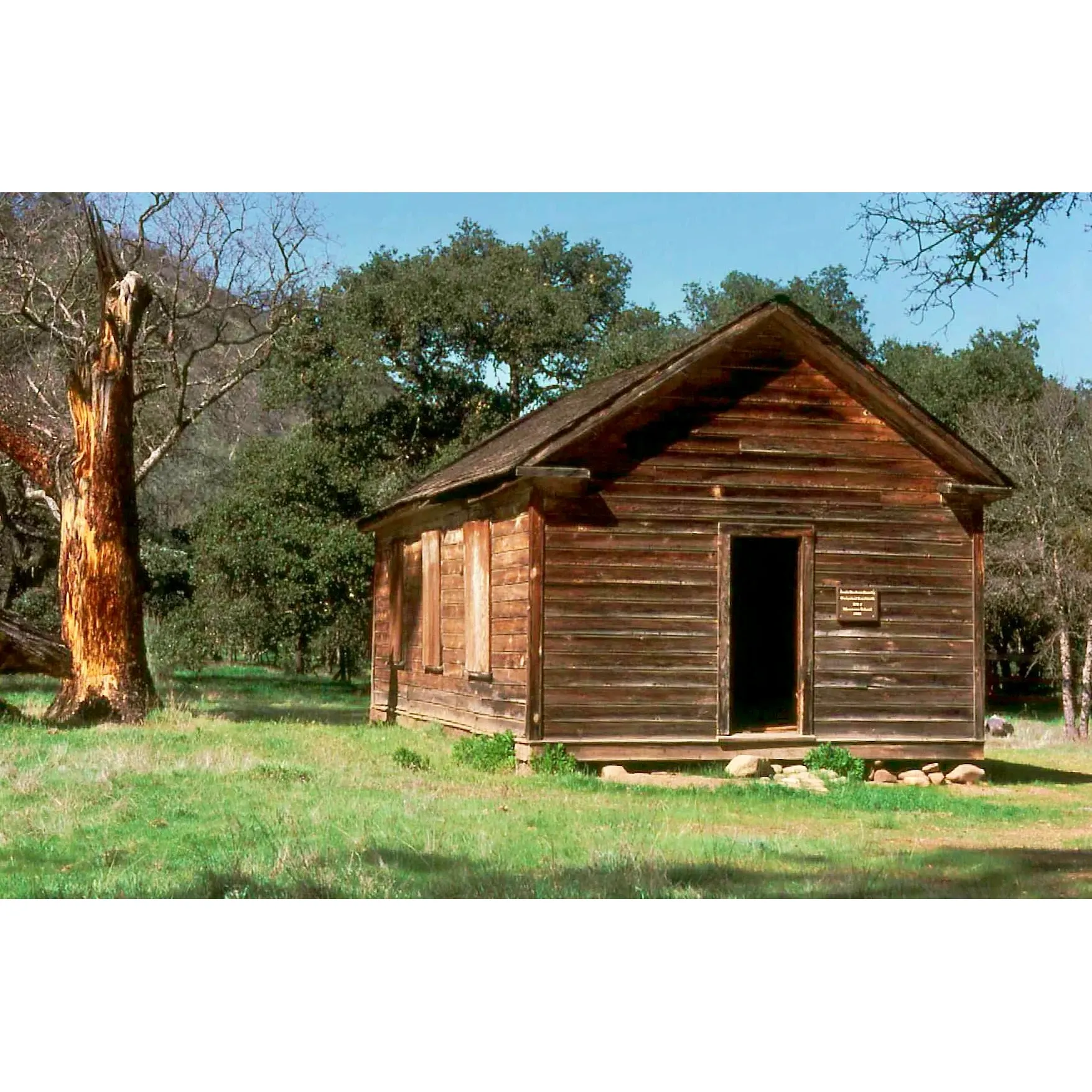 Manzana Schoolhouse Camp offers an idyllic and serene camping experience for outdoor enthusiasts. This unique destination is rich in history, standing as a monument to the early American settlers who established a village in the 1880s, with its original schoolhouse still remarkably intact after serving multiple purposes throughout the decades.

Situated in a scenic landscape, the camp provides awe-inspiring views and is a haven for those seeking tranquility and a connection with nature. Campers can find solace in the remote setting, often having the opportunity to enjoy total privacy in the outdoors. Perfectly positioned by a creek, which is subject to seasonal changes, the campsite allows visitors to immerse themselves in the rustic charm and simpler way of life.

The surroundings are conducive to challenging hikes, such as the journey across Hurricane Deck which rewards trekkers with breathtaking vistas. The trails lead adventurers through diverse terrain, including switchbacks that invigorate the body and spirit. For pet lovers, the camp is also friendly to four-legged companions who can frolic in the nearby water, under the watchful eyes of their owners.

Those seeking a more relaxed pace can appreciate the calm of the small meadows, take pleasure in the cool waters during the warmer months, and relish the vibrant display of wildflowers that spring brings to life. The camp is also well-suited for those who embrace a more rugged camping style, offering essential amenities such as a thoughtfully placed toilet that boasts impressive views.

With its spacious camping spots set amidst a backdrop of natural beauty and historical significance, Manzana Schoolhouse Camp remains a cherished destination for those who love the great outdoors, offering timeless memories and an escape from the hustle and bustle of modern life. The camp remains a special retreat that blends adventure with the soothing calm of the wilderness. Description by ChatGPT.