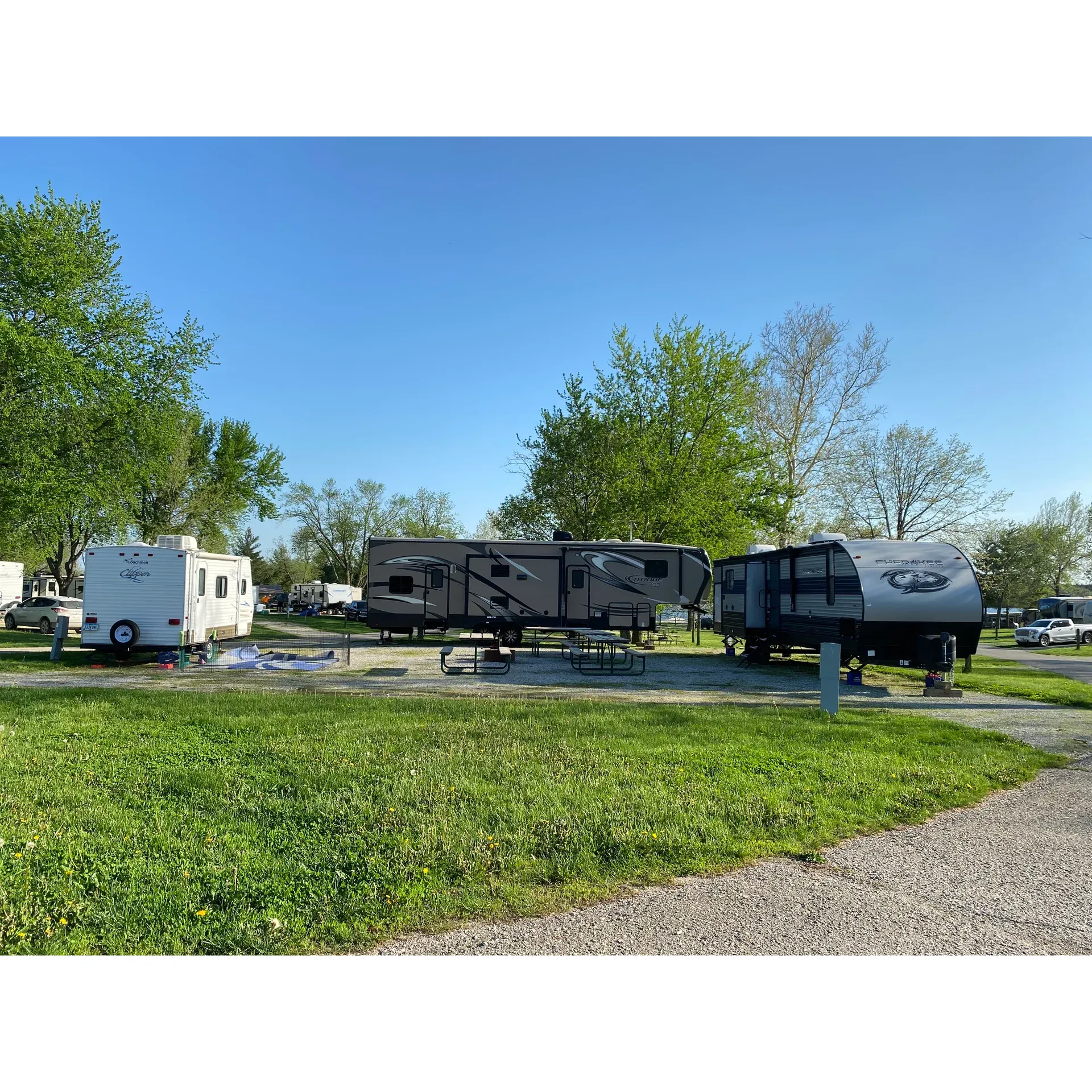 Green Valley State Park Campground emerges as a favored destination for outdoor enthusiasts seeking a blend of scenic tranquility and recreational activities. Boasting an idyllic lakeside setting, the campground offers an array of tent sites that allow guests to awaken to serene waterscapes and the gentle rustle of nature. With modern amenities like well-maintained shower houses, visitors can enjoy the comforts of home while immersed in the great outdoors.

The campground is a hiker's paradise, with miles of trails spanning from densely wooded areas on the west to smoothly paved pathways on the east. Whether seeking a peaceful stroll or an invigorating hike, adventurers will find a trail that matches their pace, winding all the way into the neighboring town, culminating at the picturesque McKinney Park. For those preferring a leisurely approach, the paved path leading into town offers a convenient route past amenities such as the local YMCA and Greater Regional Health.

Anglers and beachgoers will find their own slice of heaven with the ample fishing opportunities and a welcoming beach area perfect for soaking up the sun or taking a refreshing dip. Treasure hunters and geocaching aficionados will be thrilled with the plentiful hidden caches dotted throughout the park, offering an exciting way to explore the surroundings.

Accommodations at Green Valley State Park Campground are versatile, including three cozy cabins available for rental, ensuring a comfortable stay for all preferences. The campground is well-equipped to host guests year-round, featuring nearly 100 sites, including a selection of picturesque lakeside tent sites. With two modern bath and shower houses, stays here are made even more pleasant by the available conveniences.

The atmosphere of the campground is characterized by its tranquility and natural beauty, complemented by the warmth and assistance provided by the incredibly helpful staff. Whether seeking solitude or a friendly base for outdoor pursuits, Green Valley State Park Campground delivers a welcoming and memorable experience for campers and nature lovers alike. Description by ChatGPT.