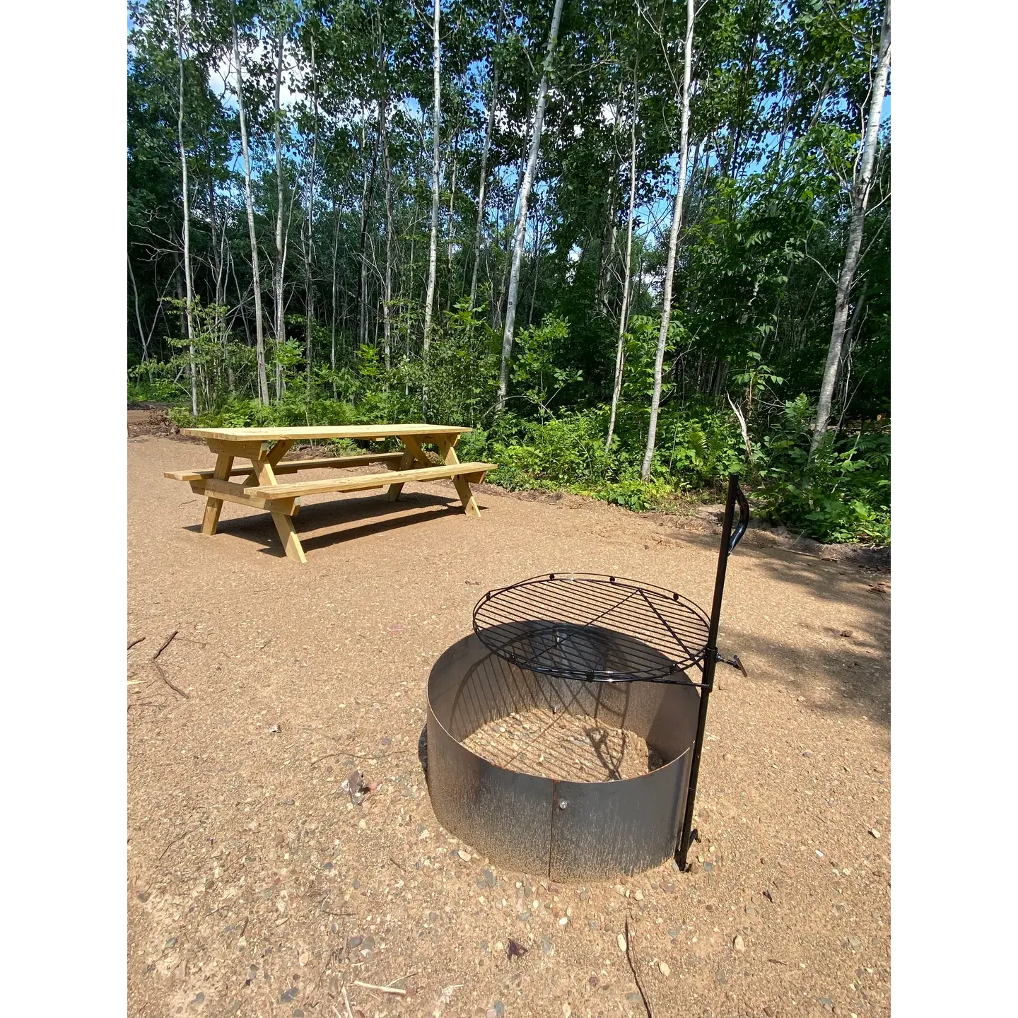 Cuyuna Range Campground offers an idyllic escape for campers seeking the tranquility of the great outdoors combined with the convenience of modern amenities. The campground delights visitors with its spacious and private sites, each surrounded by lush clumps of trees that afford a sense of seclusion and intimacy. The campsites are very well-maintained, level, and equipped with brand new picnic tables, perfect for a family meal or a gathering of friends.

Guests have praised the campground's serene atmosphere, particularly noting the quiet nights that enhance the natural soundscape, including the occasional howl of distant wolves. The extraordinary size of the individual sites is a standout feature, allowing for ample space to set up and enjoy the surroundings without feeling crowded.

For those looking to immerse themselves in nature, Cuyuna Range Campground is a haven. Star gazers will revel in the minimal light pollution, providing an excellent opportunity for celestial observations on clear evenings. Additionally, the campground's proximity to natural attractions, including nearby mountain bike trails and historical sites, offers a variety of outdoor activities and enriching experiences for adventurous spirits.

The on-site amenities such as 50/30/20 amp electrical service, sewer hookups, and readily available firewood support a comfortable and hassle-free camping experience catered to self-contained RVs. Despite its relative newness, the campground has already established a reputation for great customer service, with owners who are responsive, accommodating, and deeply invested in guests' satisfaction.

Moreover, Cuyana Range Campground's location is conveniently close to the town of Crosby, allowing for easy access to local dining favorites such as Rafferty's Pizza, while still maintaining the allure of a woodland retreat. Online booking processes enhance the ease of scheduling a stay, and the management's flexibility with reservation changes underscores their commitment to customer care.

While currently designed for RVs with full hookups, Cuyuna Range Campground is quickly gaining popularity as a community staple, where tranquility meets the comforts of modern camping, promising an exceptional outdoor experience for all who visit. Description by ChatGPT.