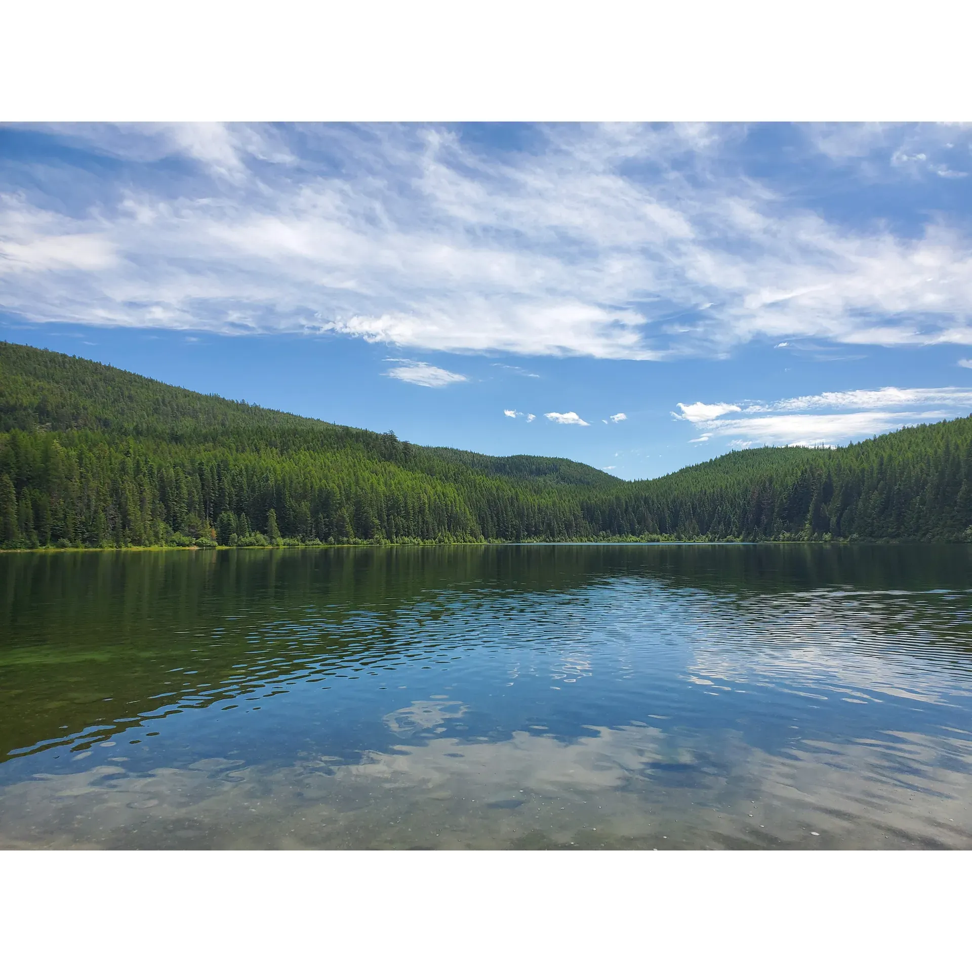 Howard Lake Campground offers an idyllic escape for families, nature lovers, and outdoor enthusiasts seeking tranquility and beautiful scenery. Guests frequently rave about the picturesque walks along the lake's perimeter, where the stillness of the environment is only broken by the majestic sight of bald eagles in flight and deer roaming freely in their natural habitat.

Visitors express a deep fondness for the seclusion and beauty of this campground. The small lake is a gem that captivates with its stunning views, making it a perfect backdrop for those cherished family outings or serene solo retreats. The campground's atmosphere is described as exceptionally peaceful, ideal for anyone looking to unwind in nature's embrace.

Apart from the scenic beauty, Howard Lake is recognized as an excellent spot for aquatic adventures. Kayaking enthusiasts find the calm waters of the lake ideal for paddling, and the abundant space allows for picnicking by the waterfront, providing a picturesque setting for a meal al fresco. Additionally, the location is highlighted as a prime fishing spot, encouraging visitors to bring their gear and enjoy a day of catching fish in the tranquility of the surroundings.

While the route to Howard Lake Campground may be challenging for some vehicles, the consensus among visitors is that the journey is well worth it, with recommendations to come equipped with kayaks, fishing poles, and a sense of adventure. Guests are encouraged to come prepared for an outdoor experience, bringing along bug spray to ensure a comfortable stay amidst the lush surroundings.

Overall, Howard Lake Campground stands out as a cherished retreat for those looking to connect with nature, indulge in outdoor activities, and create lasting memories with loved ones in a stunning, peaceful setting. The experience is a testament to the campground's allure, where the surrounding wilderness captivates, and the allure of the lake beckons. Description by ChatGPT.