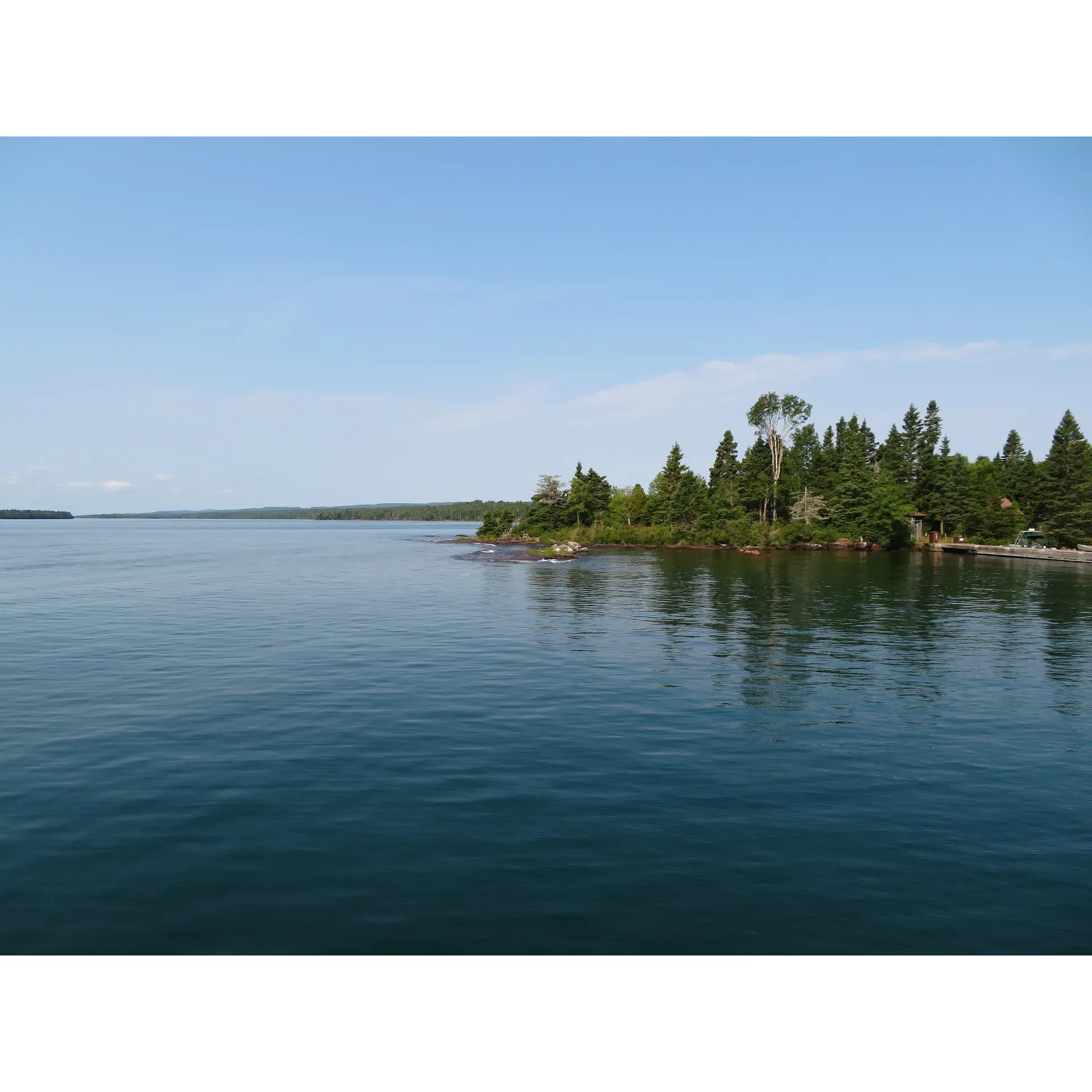 Malone Bay Campground is a picturesque outdoor haven that provides visitors with an unforgettable lakeside camping experience. Occupying a prime location with exceptional views of the shimmering waters, this tranquil retreat offers campers a chance to immerse themselves in the beauty of nature. Whether you're looking to escape the hustle and bustle of daily life or embark on aquatic adventures, Malone Bay Campground is equipped to cater to your needs.

The campground boasts a variety of well-maintained shelters perfect for individuals, families, or larger groups seeking solace and comfort amidst the great outdoors. Imagine waking up to the gentle lapping of water against the shore and spending your days basking in the serene ambiance of the waterside.

With convenient dock access, guests are encouraged to bring their boats, kayaks, or canoes to explore the scenic surroundings from a different perspective. Whether it's angling for the catch of the day or simply gliding across the calm water, the access to aquatic activities enhances the camping experience, making it a favorite for water enthusiasts.

Malone Bay Campground stands out as one of the top destinations within the park, favored for its well-appointed sites that cater to a wide range of camping preferences. Regardless of whether you're pitching a tent under the stars or cozying up in a shelter, the memory of a tranquil evening watching the sunset over the water is sure to be etched in your mind.

The area is enveloped in natural splendor, offering guests ample opportunities to connect with the environment. From the early morning birdsong to the quiet rustle of the leaves, the campground is a living showcase of nature's symphony.

Overall, Malone Bay Campground is a delightful escape that promises peace, pleasure, and the joy of lakeside living in the embrace of a beautiful natural setting. Whether you're here to partake in the array of water activities or simply to relax and rejuvenate, the campground welcomes you to create lasting memories in this slice of paradise. Description by ChatGPT.