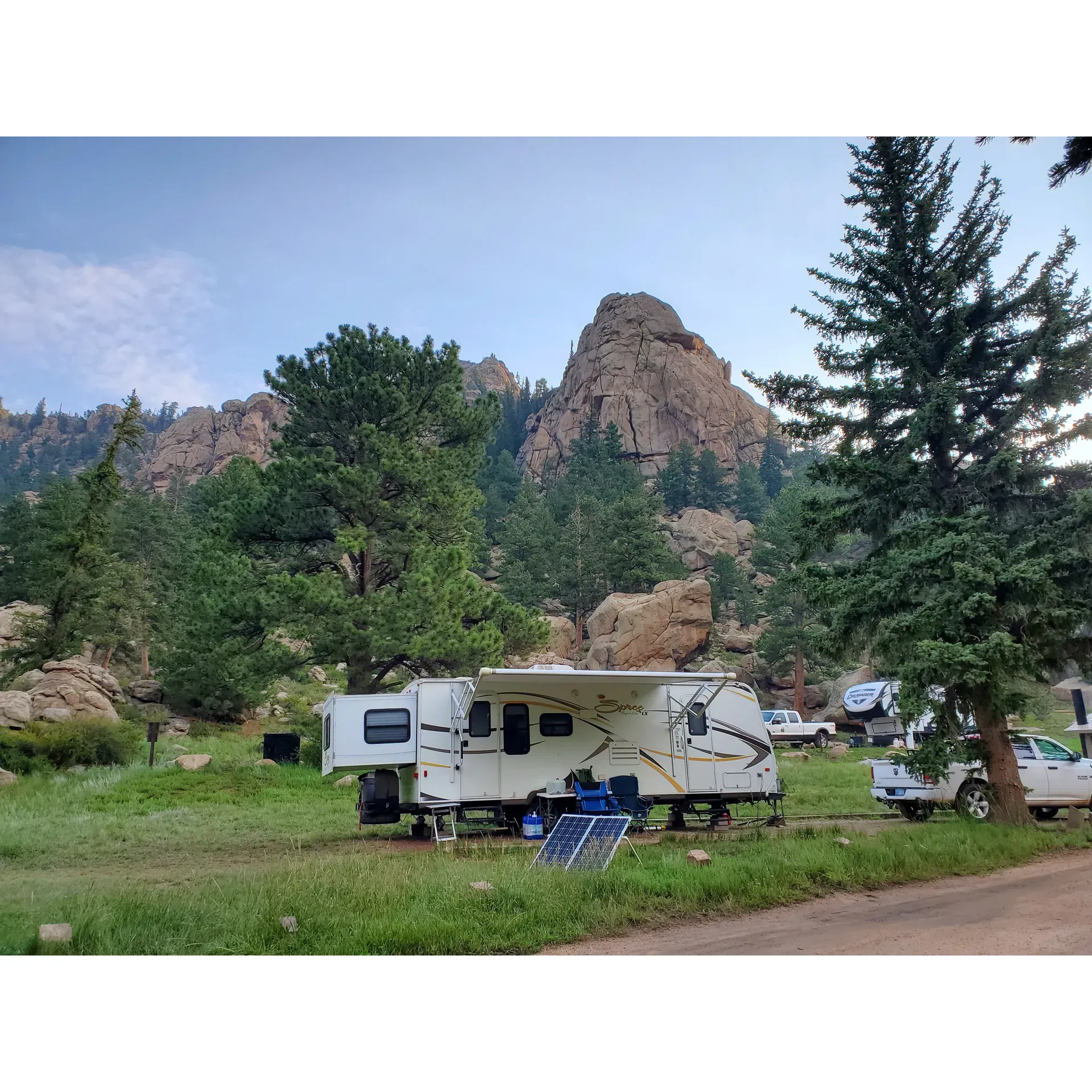 Spillway Campground at Eleven Mile Canyon is a serene, family-friendly retreat that emerges as a haven for outdoor enthusiasts of all ages. With crystal-clear, tranquil waters, it's the perfect destination for children to indulge in water play, while avid anglers revel in the abundance of large fish, making memorable captures with artificial lures in the catch-and-release stretch of the river.

Visitors are enticed to bring along their tubes and take to the water for a leisurely float, or venture out on hikes to nearby lookout points that offer stunning panoramic views. Campsite 17, in particular, receives high praise for its exclusive water access, providing a private slice of nature's tranquility for its guests.

The campgrounds are consistently maintained with cleanliness as a priority, and the provision of essentials such as vault toilets, well water, and dumpsters ensures a comfortable stay, although guests should plan to bring their own wood from nearby Lake George. The friendly and welcoming camp hosts are a highlight of the campground, going above and beyond to ensure that every stay is enjoyable. 

The spellbinding riverside campsites beckon those looking to immerse themselves in the sounds and sights of nature, and the unique rock outcroppings offer a distinct camping experience. For the adventurous spirit, the Overlook Trail presents an invigorating 45-minute hike with rewarding vistas of 11 Mile Reservoir and its impressive dam. 

A nominal fee grants access to the campground through the scenic dirt road of Eleven Mile Canyon, where pullouts allow visitors to fully appreciate the majestic scenery flanking the river. The harmonious blend of well-maintained facilities and natural splendor makes Spillway Campground a sought-after destination, with the starlit skies and local wildlife, such as deer and raccoons, adding to the enchantment of your wilderness escape. 

Adventurers can be assured of treasured memories, from the simplest of pleasures, like breathing in the fresh mountain air, to the thrill of connecting with nature and family in a landscape that offers easy fishing access and photo-worthy moments at every turn. Spillway Campground at Eleven Mile Canyon is indeed a jewel for those looking to replenish their spirit in the embrace of Colorado's majestic outdoors. Description by ChatGPT.