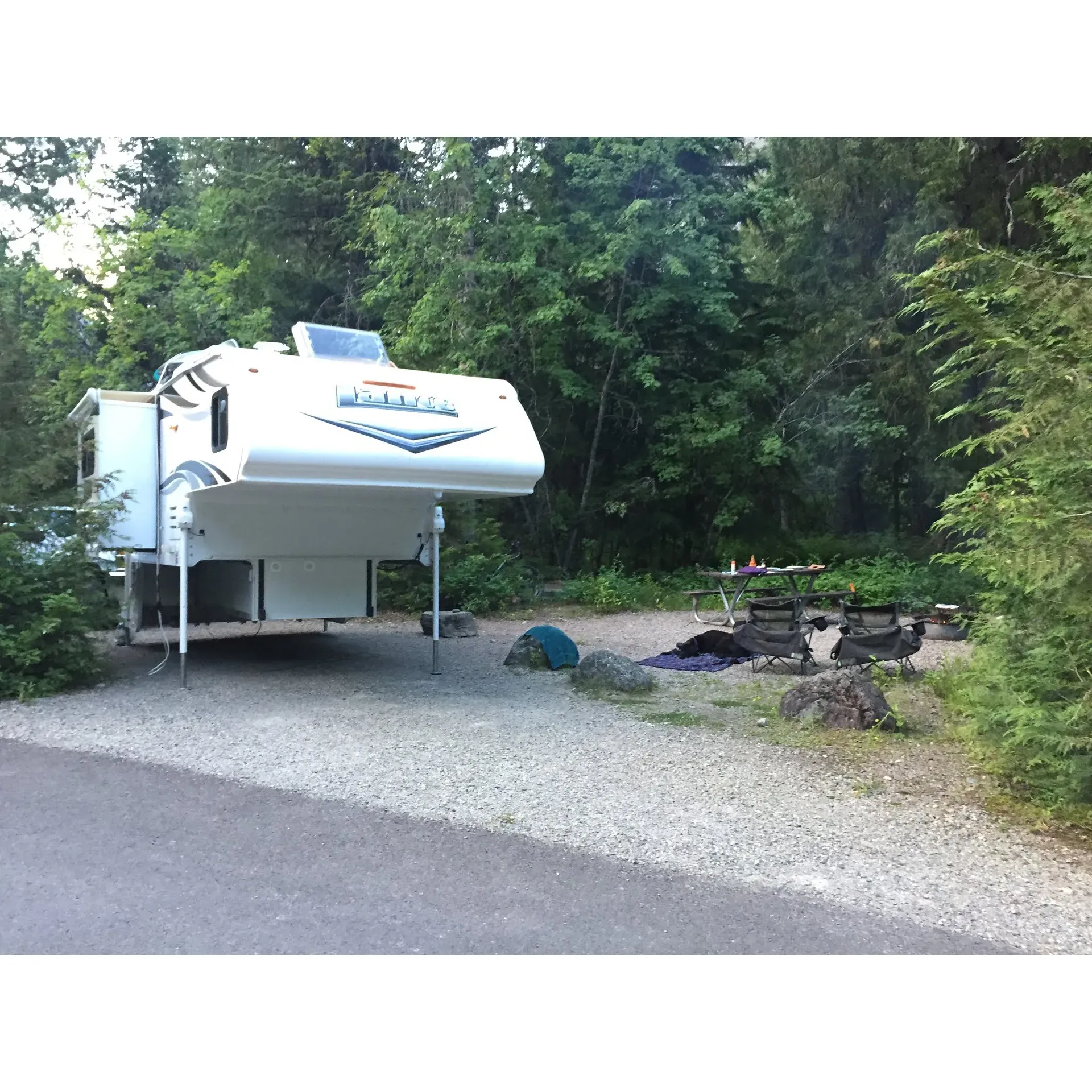 Avalanche Campground is a scenic retreat within the majesty of Glacier National Park that delights outdoor enthusiasts with its ample and spacious spots, offering an experience that feels both secluded and private. This serene destination entails more than just camping, it's a launchpad for adventure with direct access to some of the park's most cherished hikes, such as the trails to Avalanche Lake and the Cedars.

Enveloped by the natural canopy provided by the lush forests, each campsite promises a refreshing, shaded sanctuary, perfect for both relaxation and an intimate connection with nature. The strategic positioning within walking distance of the park's shuttle service is a major draw for visitors seeking a hassle-free journey to Logan's Pass, providing an effortless way to explore the park's higher elevations without the need for personal transportation.

Your stay at Avalanche Campground means convenience at its finest; the well-organized self-check-in system ensures a smooth start to your adventure in the great outdoors. The early birds benefit here, with the best time for campsite selection typically in the early to mid-morning, reflecting the natural ebb and flow of camper departures and arrivals.

Beyond the tranquility of your temporary forested home, the surrounding wilderness beckons with its enchanting beauty, offering a sense of solitude that's increasingly rare and precious. Whether you're setting out at dawn to enjoy the peaceful roads and potential wildlife sightings or simply lounging amid the whispers of the trees, Avalanche Campground encompasses the essence of what makes Glacier National Park a gem within the landscape of American natural wonders. Description by ChatGPT.