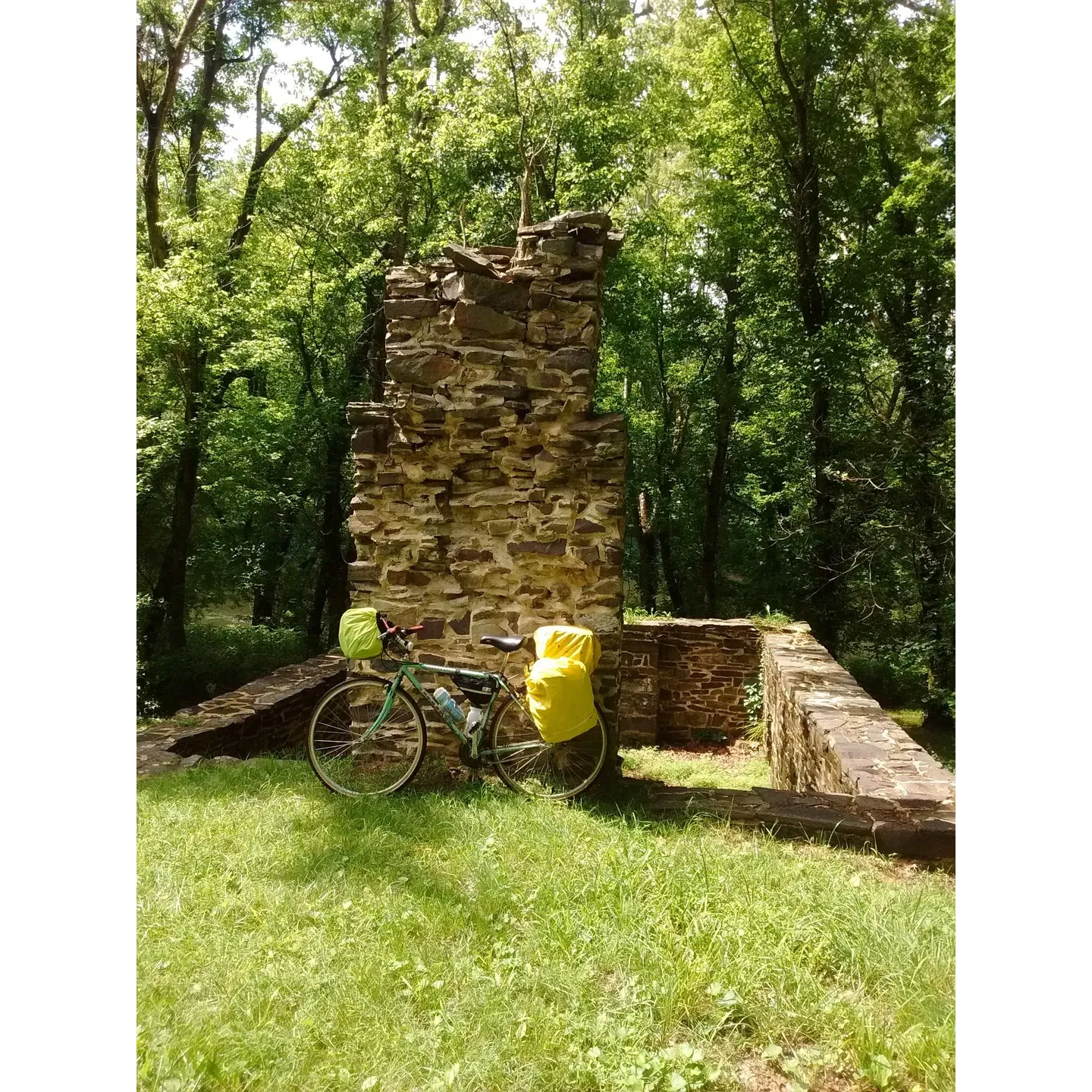 Indigo Neck Campground is an ideal destination for outdoor enthusiasts seeking a serene getaway along the historic C&O Canal. This scenic refuge offers a spacious area for hikers and bikers alike to relax and unwind, surrounded by the great outdoors. Boasting easy river access, guests are treated to tranquil views and the soothing sounds of the flowing river, enriching their connection with nature.

With two communal fire pits available, visitors have the opportunity to enjoy cozy evenings under the stars, sharing stories and making memories. The inclusion of a picnic table also provides the convenience of enjoying meals amidst the lush landscape. Indigo Neck Campground's location between Little Orleans and Pearre Station makes it a haven of seclusion, perfect for those looking to escape the bustle of everyday life.

The campground is recognized for its pristine environment, where one can bask in summer views and have a frontline seat to the river's natural beauty. It is a well-maintained site that caters to the needs of both the adventure-seeking cyclists and trekkers following the towpath, offering a peaceful spot to recharge before continuing on their journey. Visitors to Indigo Neck Campground can anticipate an experience that harmonizes rustic charm with the raw beauty of nature. Description by ChatGPT.