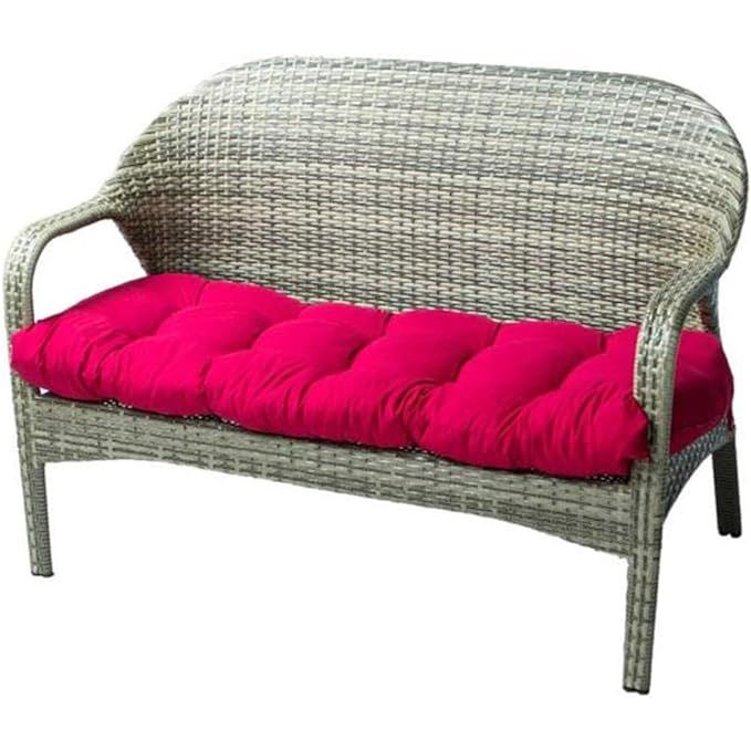 The Indoor/Outdoor Bench Cushion is made of cotton material and designed for use on garden furniture like loveseats and benches. With dimensions of 51.2"x19.7", it is suitable for most standard-sized patio wicker seats and loungers. The cushion comes in a vibrant red color, adding a pop of warmth and style to your outdoor seating area.