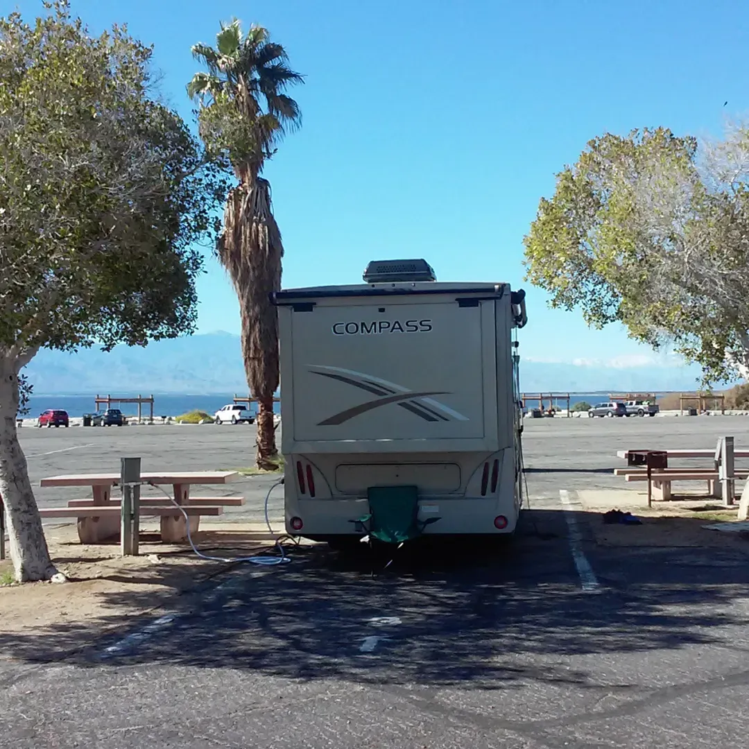 Headquarters Campground offers an impeccable outdoors experience that brings guests back time and again. Boasting well-maintained facilities, visitors regularly compliment the campground on its exceptional cleanliness, particularly enjoying the hot showers that are a comfort after a day of exploration. The proximity to the Salton Sea adds a unique and very interesting dynamic to the stay, encouraging many to make plans for a return visit to delve deeper into the area's natural and mysterious beauty.

Outdoor enthusiasts delight in the numerous hiking and biking trails available, which offer a perfect opportunity to connect with nature. The welcoming staff, including knowledgeable rangers, enhance the experience by providing valuable information, adding a personal touch to the adventure and making first-time arrivals quickly feel at home.

Campers can take advantage of top-notch utilities, which are well-organized across the campground including water, power, and sewer—meticulously spaced for convenience and functionality. Additionally, those traveling with RVs will appreciate the purity of the water here, which has been specifically noted for its extremely low Total Dissolved Solids (TDS) measurements, an essential factor for those who come with their own reverse osmosis systems.

Accommodations within the campground include level and paved sites that come with picnic tables, offering a comfortable outdoor setting for meals and social gatherings. Although the area is known for its warm climate, which is a particular draw during the cooler seasons, shade is provided throughout the campground. Additionally, each site is equipped to support air conditioning, ensuring that visitors stay cool and comfortable even on the hottest summer days.

Headquarters Campground encompasses the serenity and allure of desert camping with the benefits of modern amenities, making it an ideal spot for a peaceful getaway with the convenience and comforts that experienced campers appreciate. Description by ChatGPT.