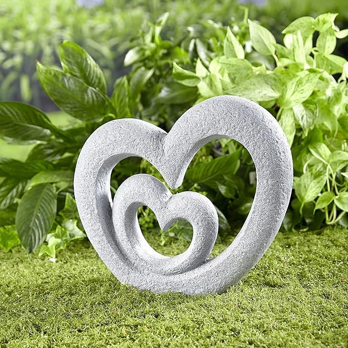 The Lakeside Collection Heart Garden Sculpture is a beautiful and unique addition to any outdoor space. It is made of durable metal and designed to withstand the elements, making it perfect for both indoor and outdoor use. The sculpture features a heart shape with intricate details and a rustic finish, giving it a charming and vintage look.