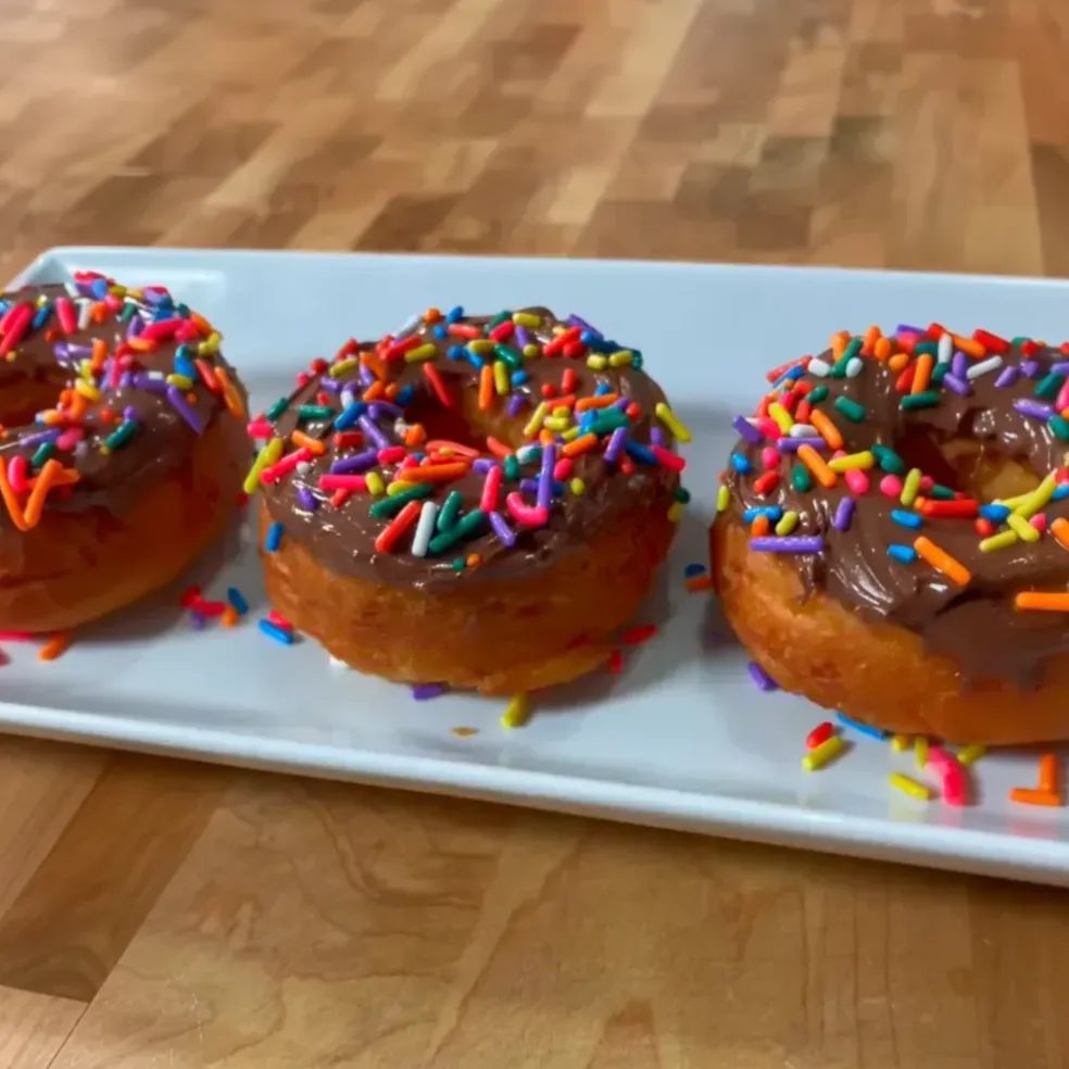 Biscuit Donuts with Nutella and Sprinkles image