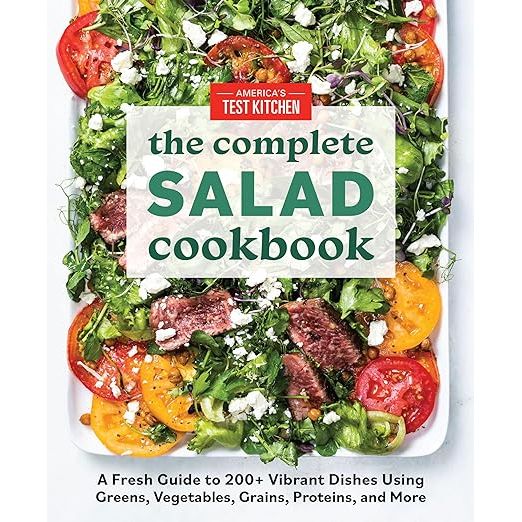 Embark on a culinary adventure with The Complete Salad Cookbook by America's Test Kitchen—an indispensable kitchen staple for salad enthusiasts and novices alike. This essential guide boasts over 200 mouthwatering salad recipes, ensuring a treasure trove of choices that promise to delight your palate. From the renowned ATK Cookbook Series, this volume celebrates the bounty of nature with its array of fresh and vibrant ingredients. Dive into a world of crisp greens, farm-fresh vegetables, wholesome grains, and succulent proteins, all waiting to be transformed into stunning salad masterpieces.

Whether you're in pursuit of the quintessential Caesar, or eager to experiment with innovative and eclectic blends, The Complete Salad Cookbook caters to every craving. Beyond its diverse recipe collection, this culinary companion imparts expert advice on the art of salad-making. Learn insider tips for selecting top-quality produce, mastering knife skills for perfect prep, and dressing your salads to impress. Designed to elevate your meals—be it a light, zesty side or a robust, satisfying centerpiece—this cookbook is tailored to fit a multitude of dietary preferences and lifestyles.

Let The Complete Salad Cookbook guide you to gastronomic excellence in the comfort of your own kitchen. Each page invites you to reinvent the salad, turning everyday ingredients into exciting, healthful feasts. With clear, easy-to-follow instructions and the trustworthy expertise of America's Test Kitchen, you're well-equipped to answer the call of fresh, flavorful dishes year-round. Make this cookbook your trusty ally in crafting simple yet sophisticated salads that are guaranteed to energize your menus and enchant your guests.