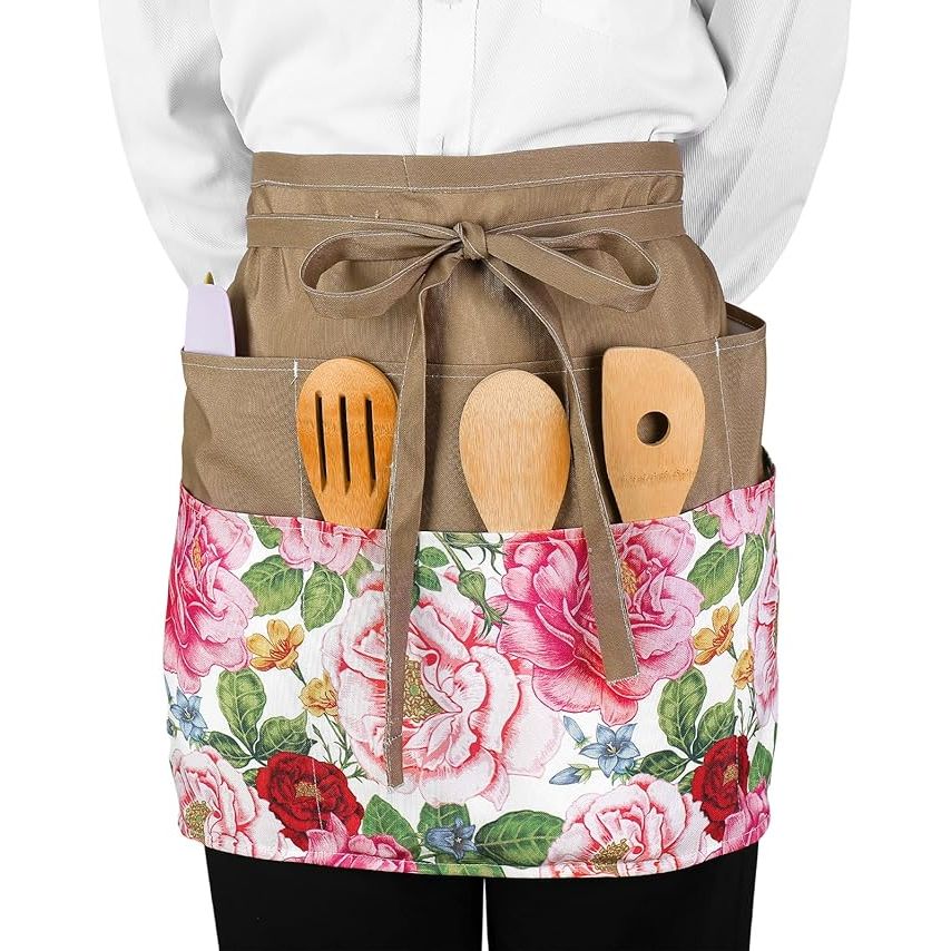 The Floral Half Apron Waist Apron is a versatile and stylish apron designed for women. It features a floral design that adds a touch of elegance to any kitchen or gardening task. This apron is perfect for cooking, baking, gardening, harvesting, or any other household chores.