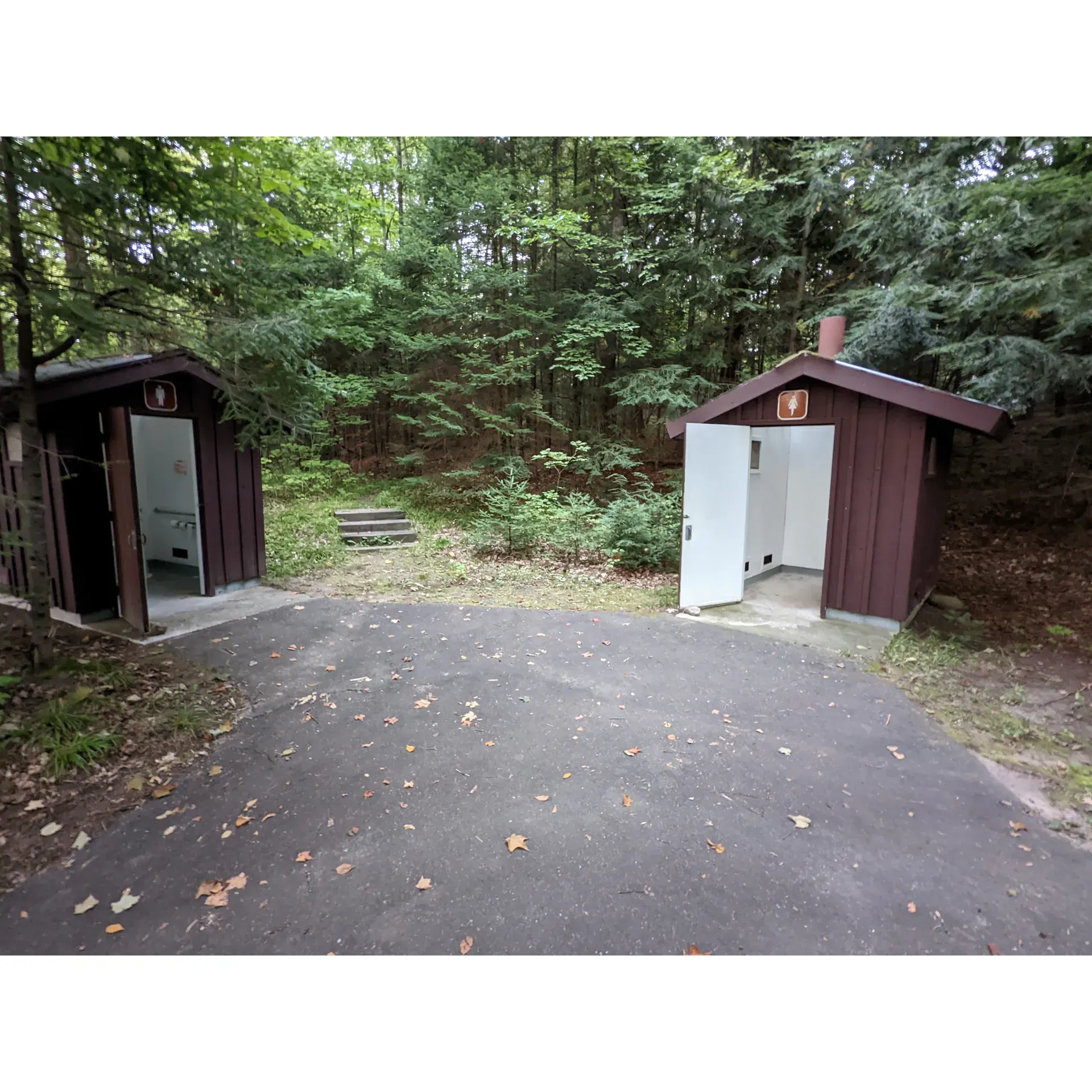 Anvil Lake Campground offers a serene retreat for outdoor enthusiasts and families alike. Visitors frequently praise its impressive clear-water, sand-bottom swimming beach, which provides an idyllic setting for relaxation and recreation. The gentle lapping of the lake’s edge and the abundance of stars visible on clear nights make for an unforgettable experience that reconnects you with nature's wonders.

Guests appreciate the meticulous upkeep of the campground, with special commendation given to the immaculate condition of the vault toilets, reflecting the dedicated efforts of the campground host to ensure a comfortable and hygienic environment. The well-maintained beach area is a highlight, offering a tranquil space for both play and peaceful contemplation.

The campground boasts a beautifully situated beach, cozy lodge, and convenient boat ramp, catering to those seeking a straightforward, authentic camping experience. While the presence of a nearby highway is noted, the reduced traffic during the nighttime hours adds to the tranquility of the campsite, allowing for a quiet evening ambiance ideal for quality family time and stargazing.

Preparedness is part of the adventure at Anvil Lake Campground, where seasoned campers suggest bringing along sturdy stakes and a hammer for tent setups. While the hand pump by the waterfront is a rustic reminder of simpler times, a main wellhouse ensures that fresh water needs are met, albeit with a short uphill walk from lakefront sites.

With its idyllic setting perched above the beautiful Anvil Lake and its no-frills camping experience, Anvil Lake Campground is the perfect getaway for those looking to unwind, spend quality time with loved ones, and enjoy the great outdoors. Description by ChatGPT.