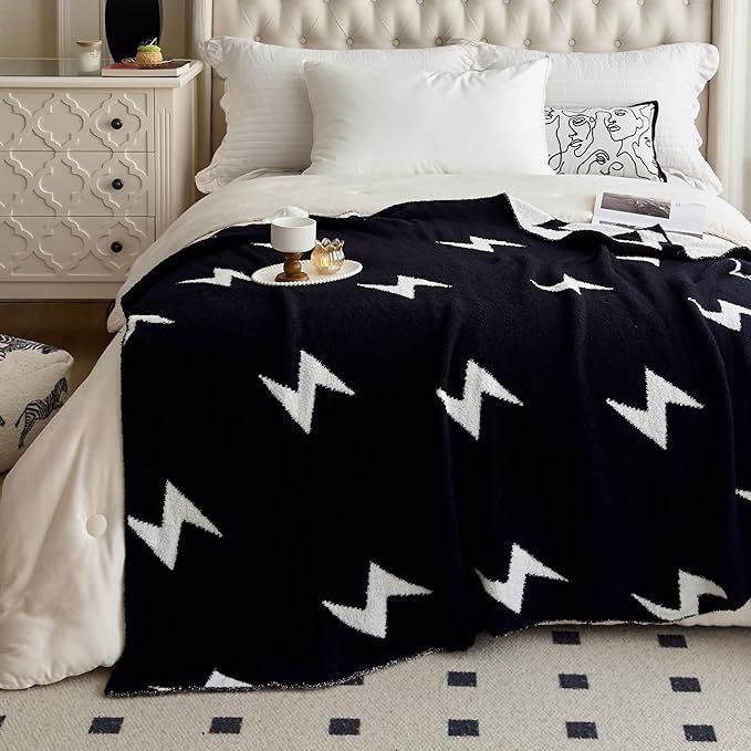 The NIDITW Ultra Soft Cozy Black Lightning Bolt Throw Blanket is made of high-quality microfiber knit material that is ultra-soft and cozy to the touch. This lightweight blanket is perfect for all seasons, providing warmth and comfort without being too heavy or bulky.