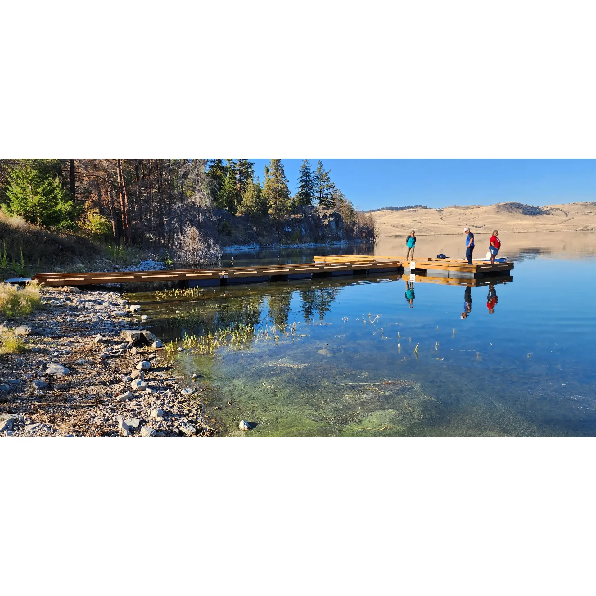 Escape to a serene oasis at Stump Lake Recreation Site, a beautifully upgraded outdoor haven boasting 17 campsites where you can disconnect from the hustle of modern life. With no cell service to interrupt your tranquility, you'll find true peace surrounded by nature's splendor. This well-maintained destination offers numerous amenities to enhance your stay, including four tidy pit toilets for your convenience.

Anglers will find themselves in paradise at Stump Lake, revered for its abundant fishing opportunities. Here, you can reel in impressive catches, like the majestic 22-inch rainbow trout weighing over 12 pounds, making it a hotspot for both casual and serious fishers.

Traveling to this secluded gem is a breeze, with a solid gravel road leading you right to the heart of outdoor enjoyment. The site features a sturdy dock and a substantial boat ramp, inviting boaters and water enthusiasts to explore the pristine waters. A sizable parking area accommodates your vehicle needs, ensuring a hassle-free start to your adventure.

The recreation site is thoughtfully maintained by its visitors, who take pride in its cleanliness and upkeep. Although you may not see a parks person, the essentials like toilet paper and a clean environment are regularly refreshed by caring users, adding to the site's welcoming atmosphere.

For those who love to cook over an open flame, there are over 20 fire rock rings available, complementing the rustic charm of this retreat. And while the refreshing breeze rolling off the lake can invigorate your experience, it's a wise idea to secure your gear to maximize enjoyment.

Whether you're settling into one of the equipped sites with a picnic table or selecting a more primitive spot to pitch your tent, Stump Lake Recreation Site promises a delightful escape for campers seeking a cute, off-the-beaten-path refuge in nature's embrace. Description by ChatGPT.