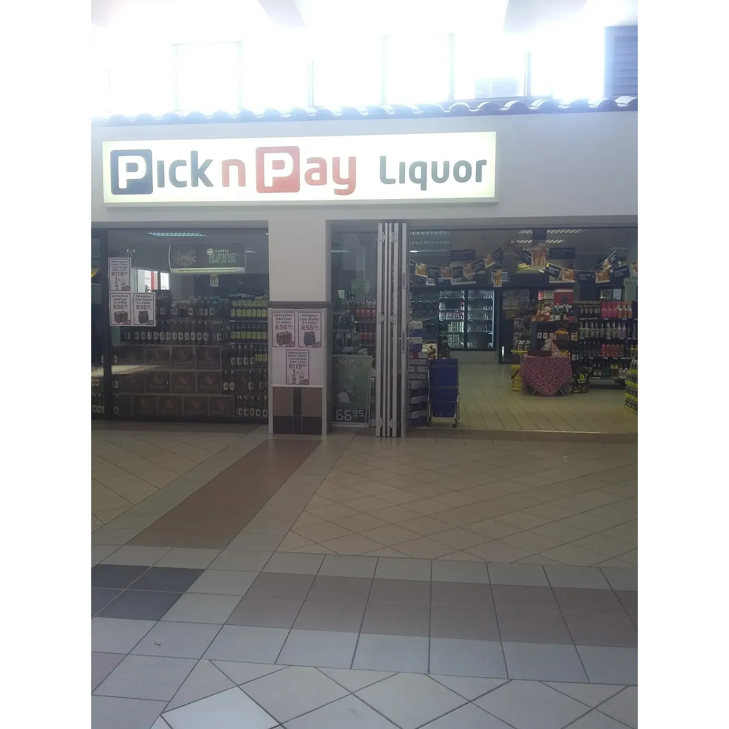 Pick 'n Pay Liquor Store is recognized for its charming atmosphere and remarkable staff who are consistently praised for their friendliness and exemplary customer service. The store offers an essential selection of spirits, wines, and beers, capturing the loyalty of patrons who appreciate finding their basic liquor needs in one convenient location. The environment within the store shines with neatness and cleanliness, providing a comfortable shopping experience for all who enter.

In particular, one standout staff member receives frequent commendations for her exceptional knowledge of the store's inventory and her genuine engagement with customers, embodying the warm and welcoming spirit that characterizes the establishment. While the store may not boast the largest variety, it's highly regarded for its overall positive atmosphere and the commendable efforts of its lovely staff to maintain a good selection. The team's dedication is noticed and appreciated by the community, with many hopeful for continued success and blessings for the staff who keep the spirit of great service alive. Description by ChatGPT.