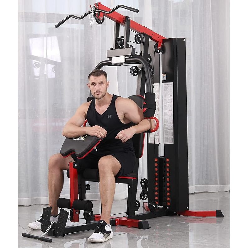 The Signature Fitness Multifunctional Home Gym System is a versatile workout station that includes a leg extension and preacher curl attachment for targeting different muscle groups. It features a 122.5lb weight stack, providing users with plenty of resistance to challenge themselves in their workouts.