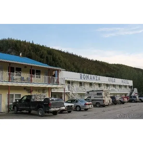 Bonanza Gold Motel & RV Park offers a straightforward, comfortable stay for travelers seeking outdoor lodging and amenities in close vicinity to Dawson City. With a focus on convenience and service, the motel and RV park provides clean, functional restroom and shower facilities, maintaining standards of cleanliness that guests appreciate. The pet-friendly environment, although requiring pets to be on leash, ensures that all guests and their furry companions are comfortable during their stay.

Guests have found the staff to be exceptionally welcoming, with special commendation for the kindness and helpfulness of the Filipina staff members. The authenticity of the service is complemented by the Northern spirit of helpfulness that has been noted by those experiencing mechanical difficulties; the establishment has proven to be accommodating even in unexpected circumstances, ensuring guest needs are addressed with resourcefulness and expertise.

For visitors with vehicles, the on-site car wash is a noted convenience—particularly useful for those journeying through the dusty roads of the north. For those traveling in RVs, the sites are adequately level, setting the stage for a solid stay. Travelers can also find essential services such as laundry and potable water available to enhance their experience.

Located a manageable distance from the heritage-rich Dawson City, the park provides an accessible gateway to the area’s attractions. While visitors should be prepared for a sun-filled ambiance due to limited shade, the openness of the park delivers unobstructed views of the surrounding landscapes. Guests, especially groups and adventurers, have expressed satisfaction with the overall offering of the park, highlighting the benefits of the amenities and the warmth of the service for those exploring the northern territories. Description by ChatGPT.