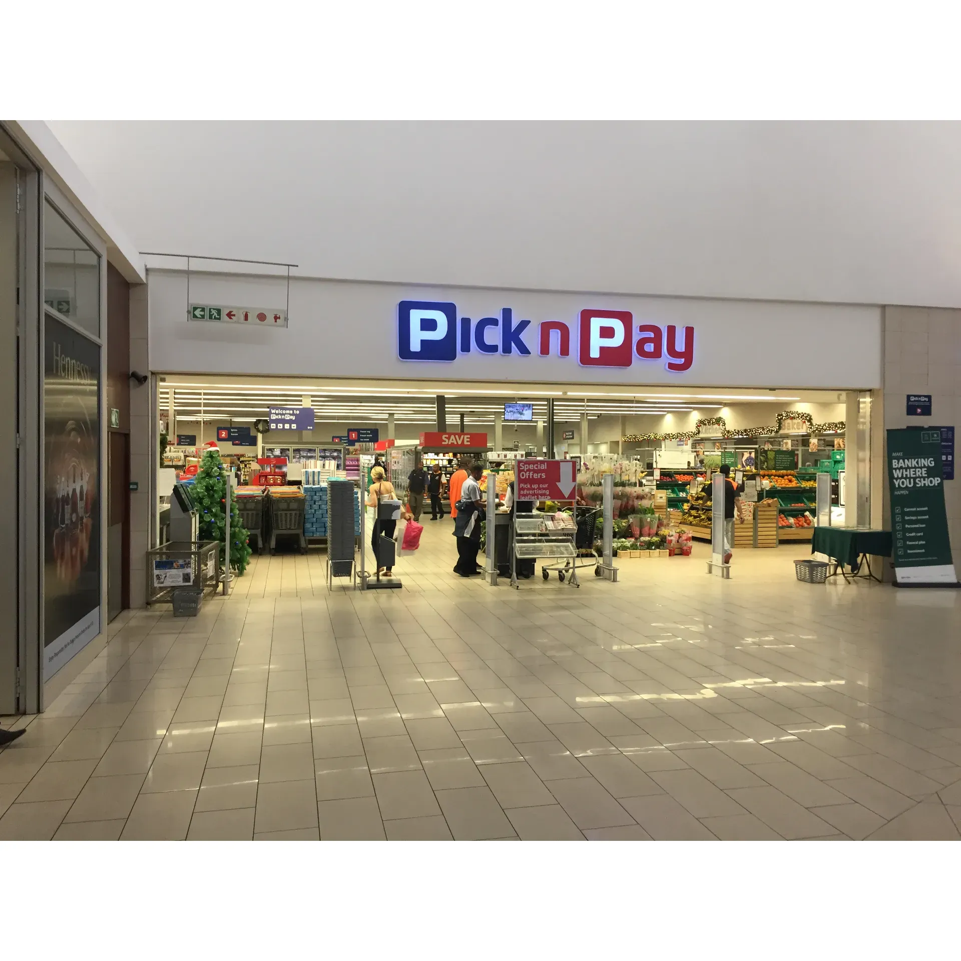 Pick n Pay stands out as a prominent retail establishment, offering a broad selection of products and services tailored to meet the necessities of the modern shopper. Well-known for its comprehensive range of high-quality groceries, the store ensures customers have access to a variety of fresh produce, bakery items, and household goods under one roof.

With a user-friendly online platform, Pick n Pay facilitates a seamless shopping experience, allowing customers to efficiently browse through specials and promotions that align with their budget and preferences. In-store, the commitment to convenience is evident as services extend beyond just grocery shopping, with amenities like ticketing kiosks to assist with travel arrangements and more, exemplifying the store's dedication to being a one-stop destination for diverse customer needs.

Pick n Pay prioritizes the shopping environment, and during peak shopping times, remains focused on enhancing the checkout process. The intention is to accommodate the influx of customers efficiently and maintain high service quality even during the busiest of hours, showing that customer satisfaction is at the forefront of their operation.

Moreover, Pick n Pay is not only about providing essentials but also about indulging the whims and fanciful desires of customers with a selection of premium products that invite moments of luxury and pleasure within the busy lives of its patrons.

As a retailer vested in the community's welfare, Pick n Pay continually strives to cultivate a shopping atmosphere where every customer feels valued, and their shopping experience is nothing short of positive, efficient, and gratifying. Description by ChatGPT.